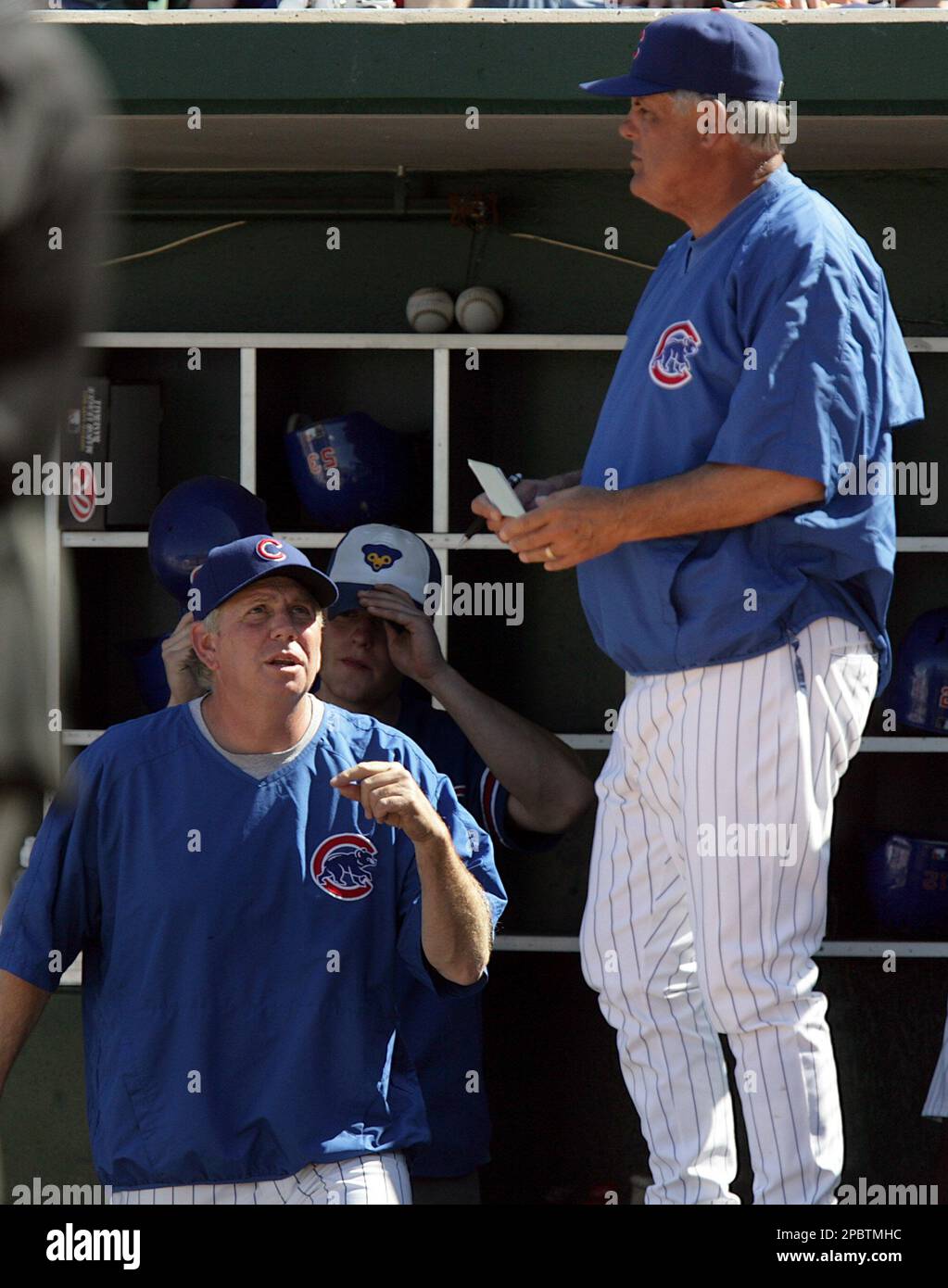 San Diego Padres manager Larry Bowa, center, comes out to talk about the  dust-off of Padres John Kruk by New York Mets pitcher Ron Darling and  umpire Steve Rippley throws manager Bowa