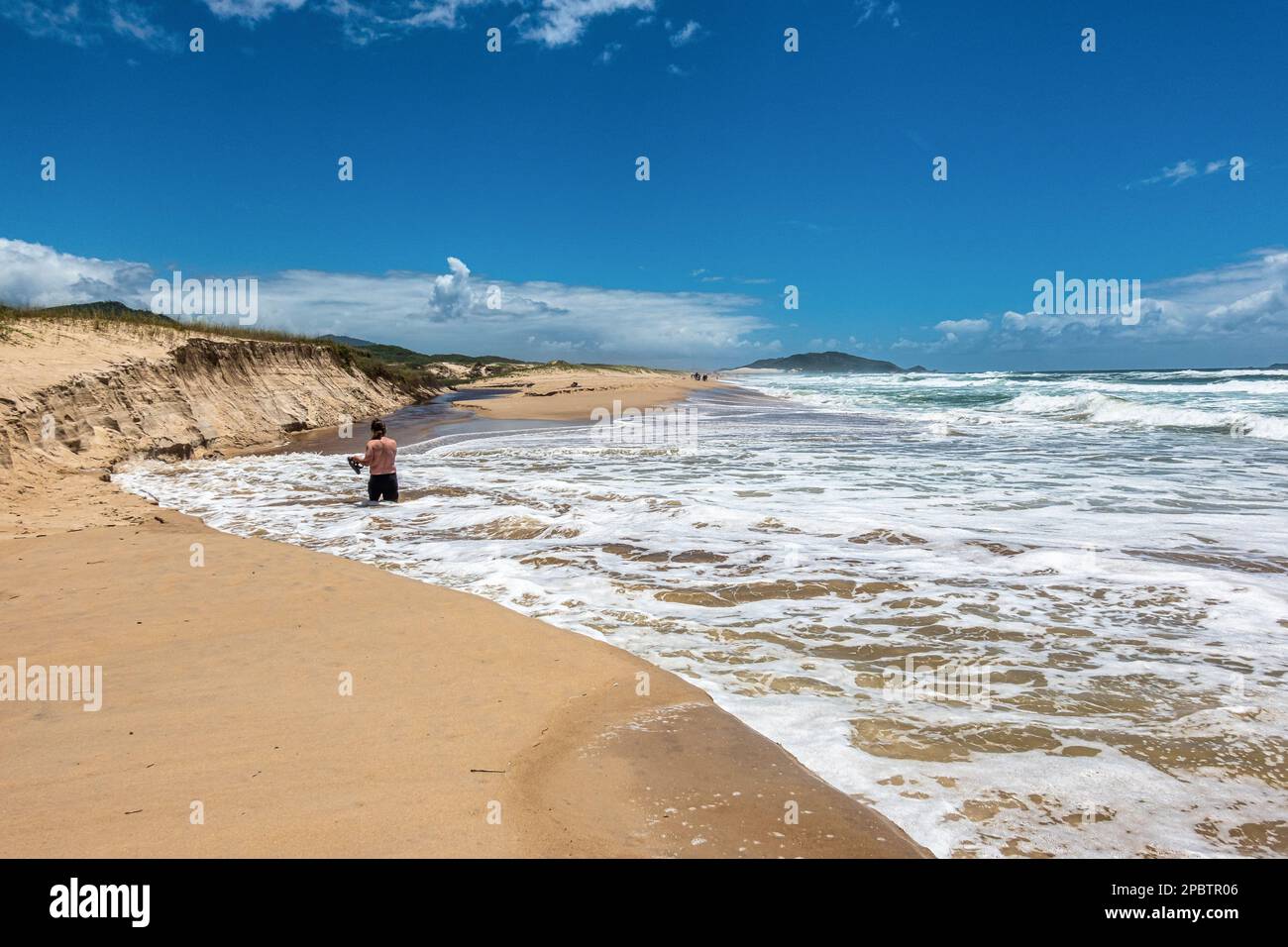 Praia do Campeche beach at Campeche, Florianopolis, Santa Catarina in Brazil. Beautiful summer day on beach. Stock Photo