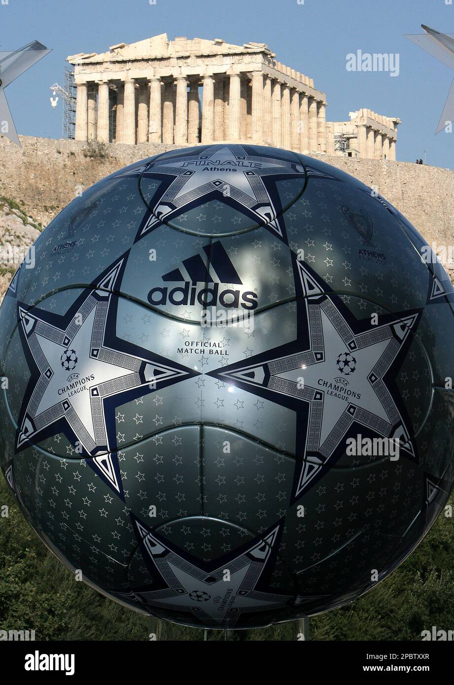 The official ball of Champions League final is seen in front of the ancient  Acropolis, in Athens on Thursday, March 8, 2007. The ceremony was held to  unveil the new ball that