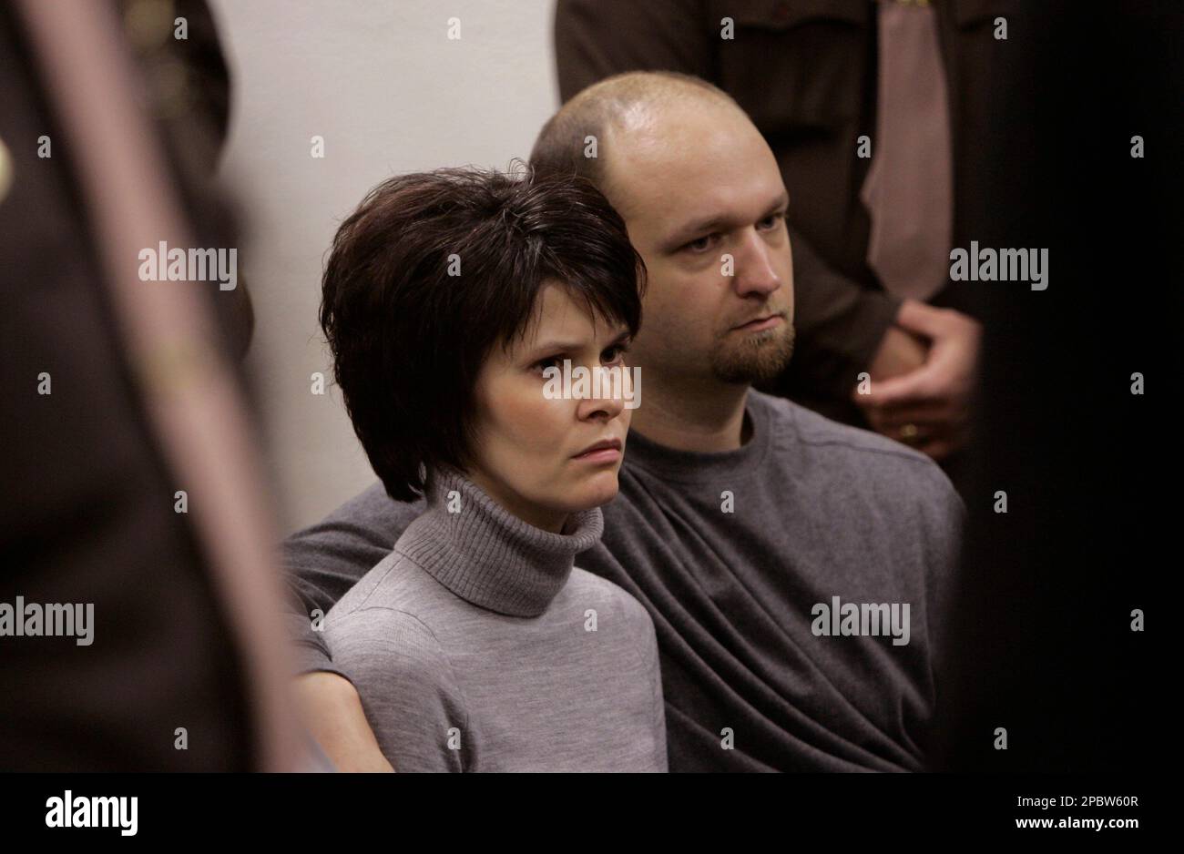 Tara Lynn Grant&rsquo;s sister, Alicia Standerfer, sits with her husband 