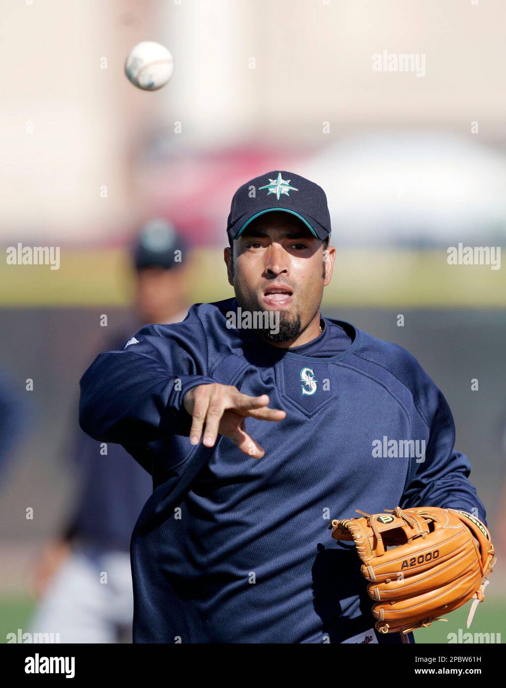 Seattle Mariners infielder Rey Ordonez throws during a drill at