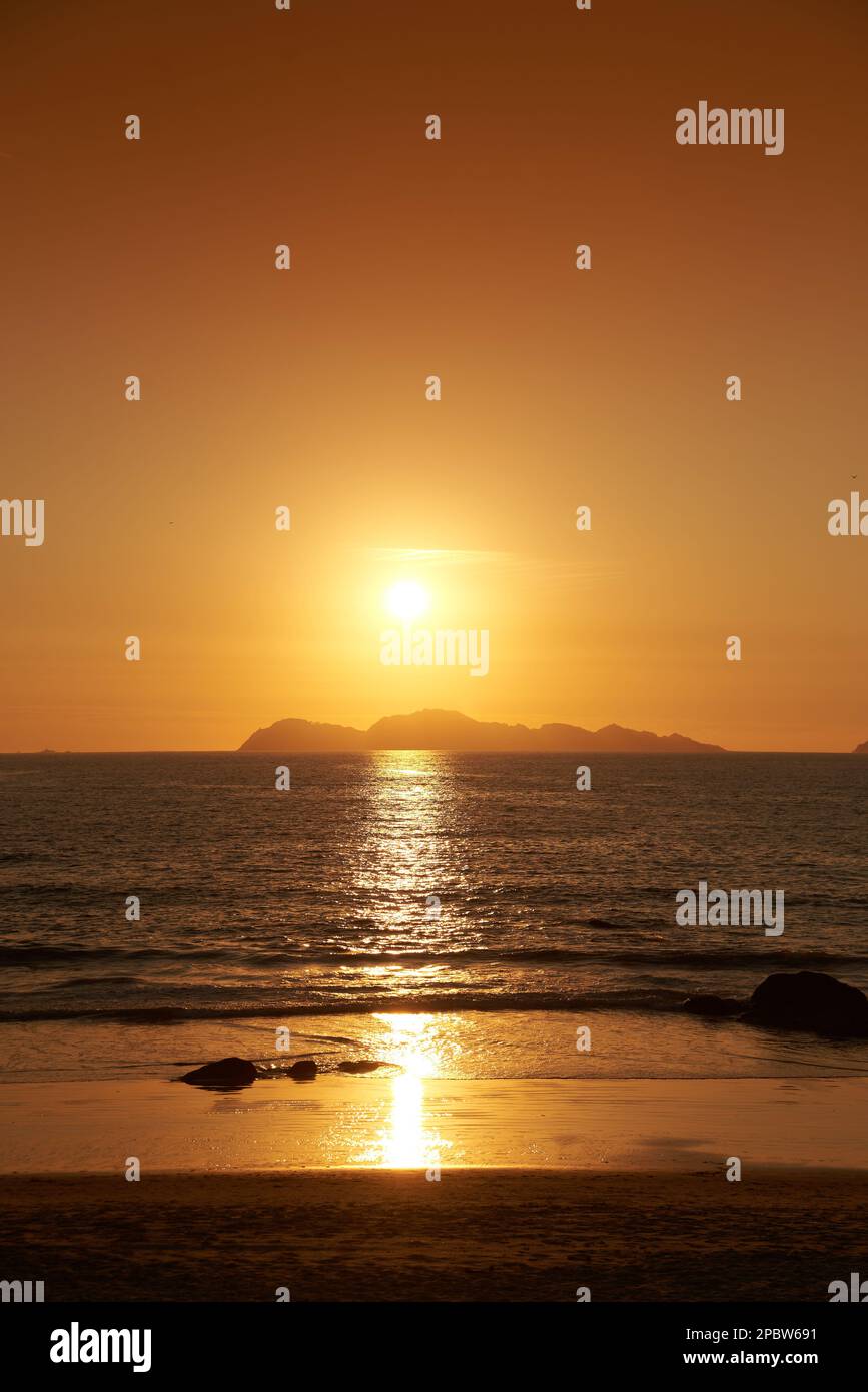 Sunset in Vigo with the Cies Islands as a backdrop Stock Photo