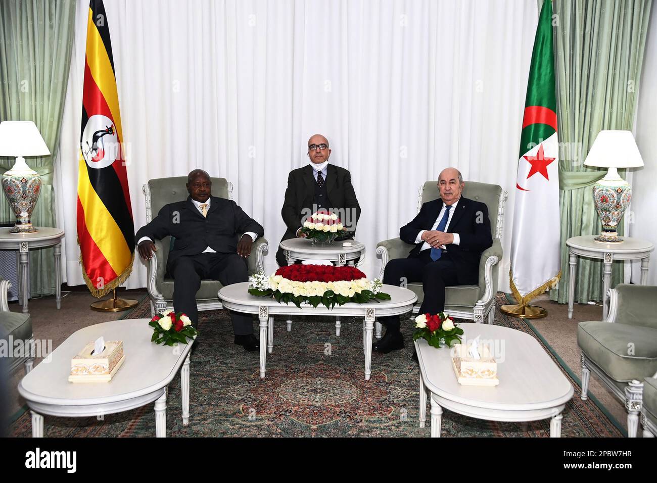 (230313) -- ALGIERS, March 13, 2023 (Xinhua) -- Algerian President Abdelmadjid Tebboune (R) meets with Ugandan President Yoweri Museveni (L) in Algiers, Algeria, on March 12, 2023. TO GO WITH 'Algeria, Uganda sign pacts to boost economic cooperation' (Algerian Presidency/Handout via Xinhua) Stock Photo