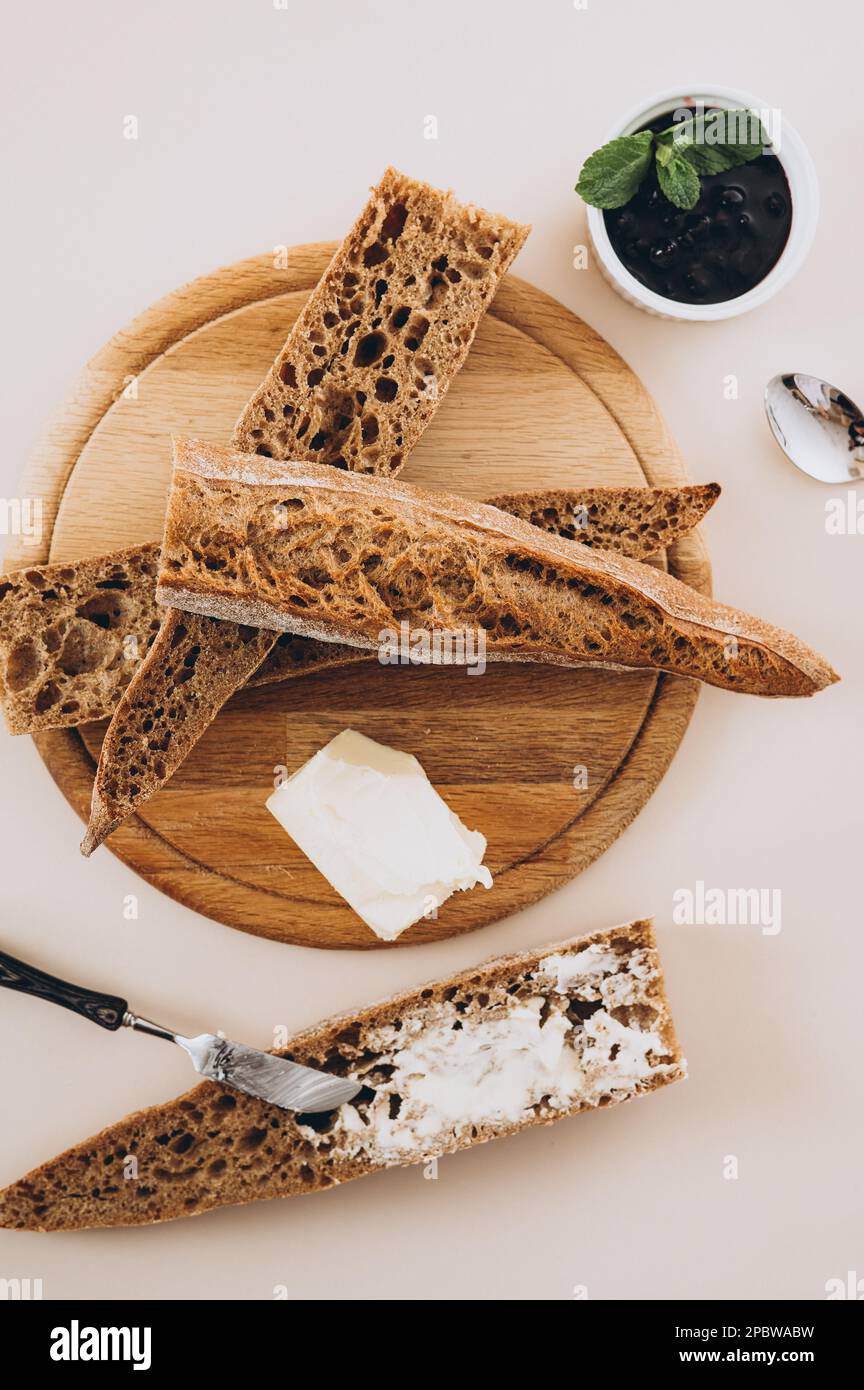 french baguette with butter and jam Stock Photo Alamy