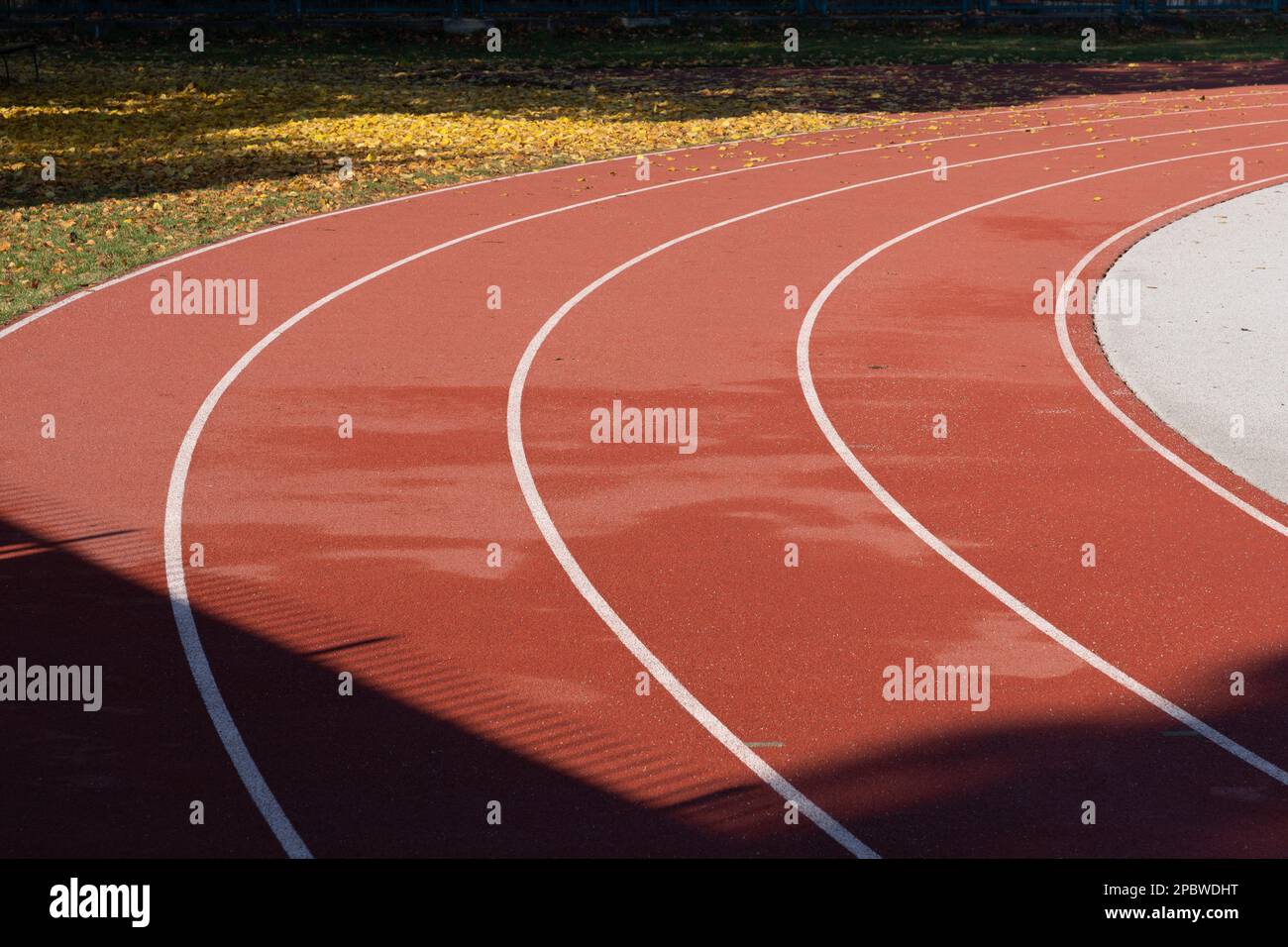 Bend of running track lanes for athletes, sport field Stock Photo Alamy