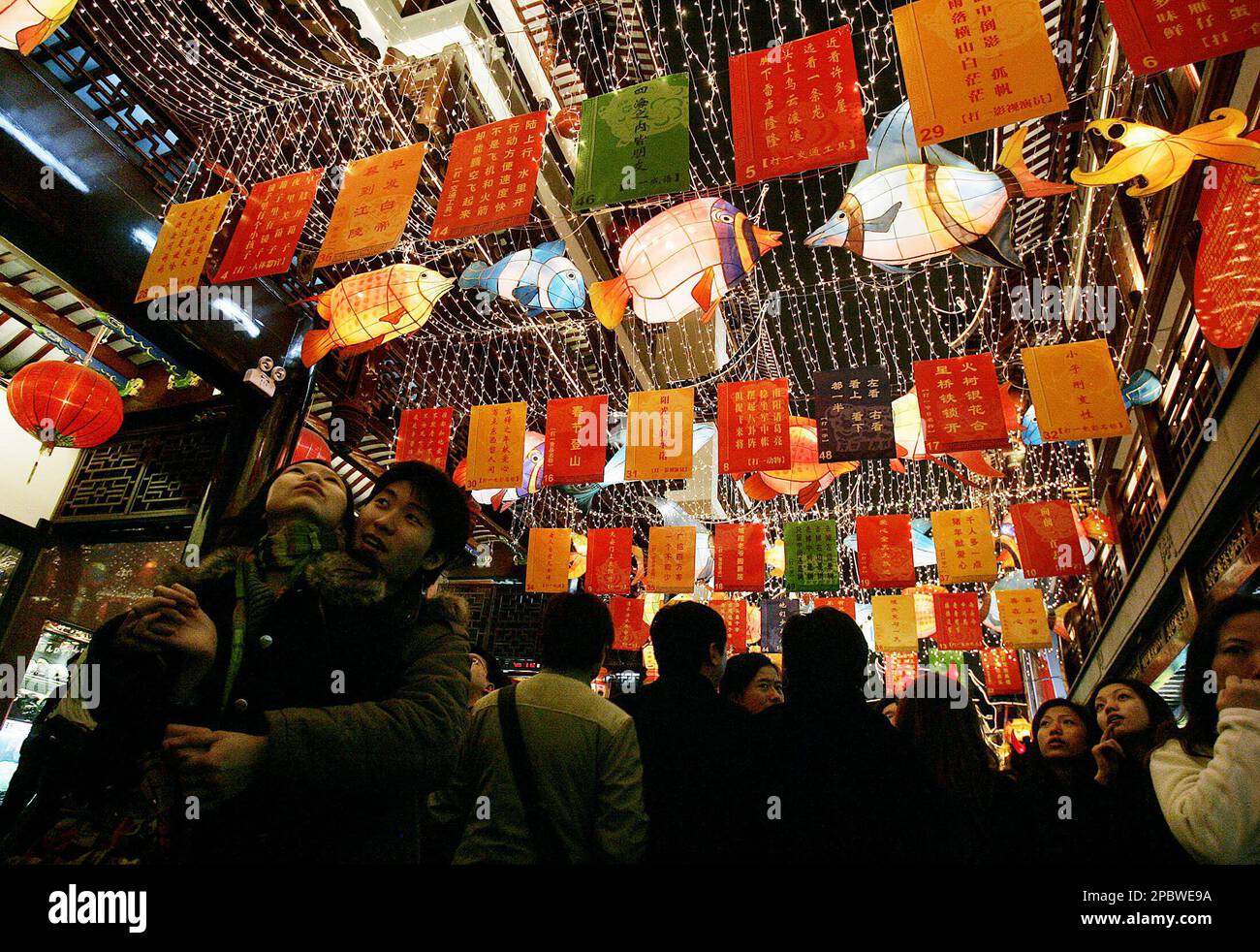 Visitors walk under the lanterns during the lantern festival in the ...