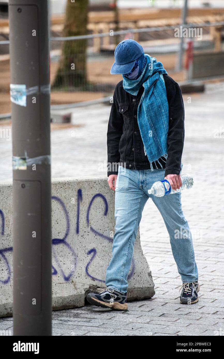 One of the accused arrives for a session of the case before the Antwerp