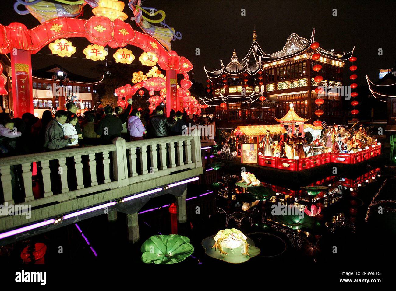 Visitors walk under the lanterns during the lantern festival in the ...