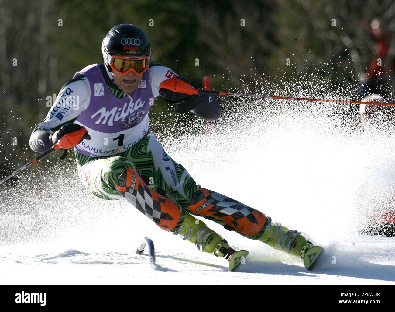 Kalle Palander, of Finland, negotiates a pole during the first run of ...