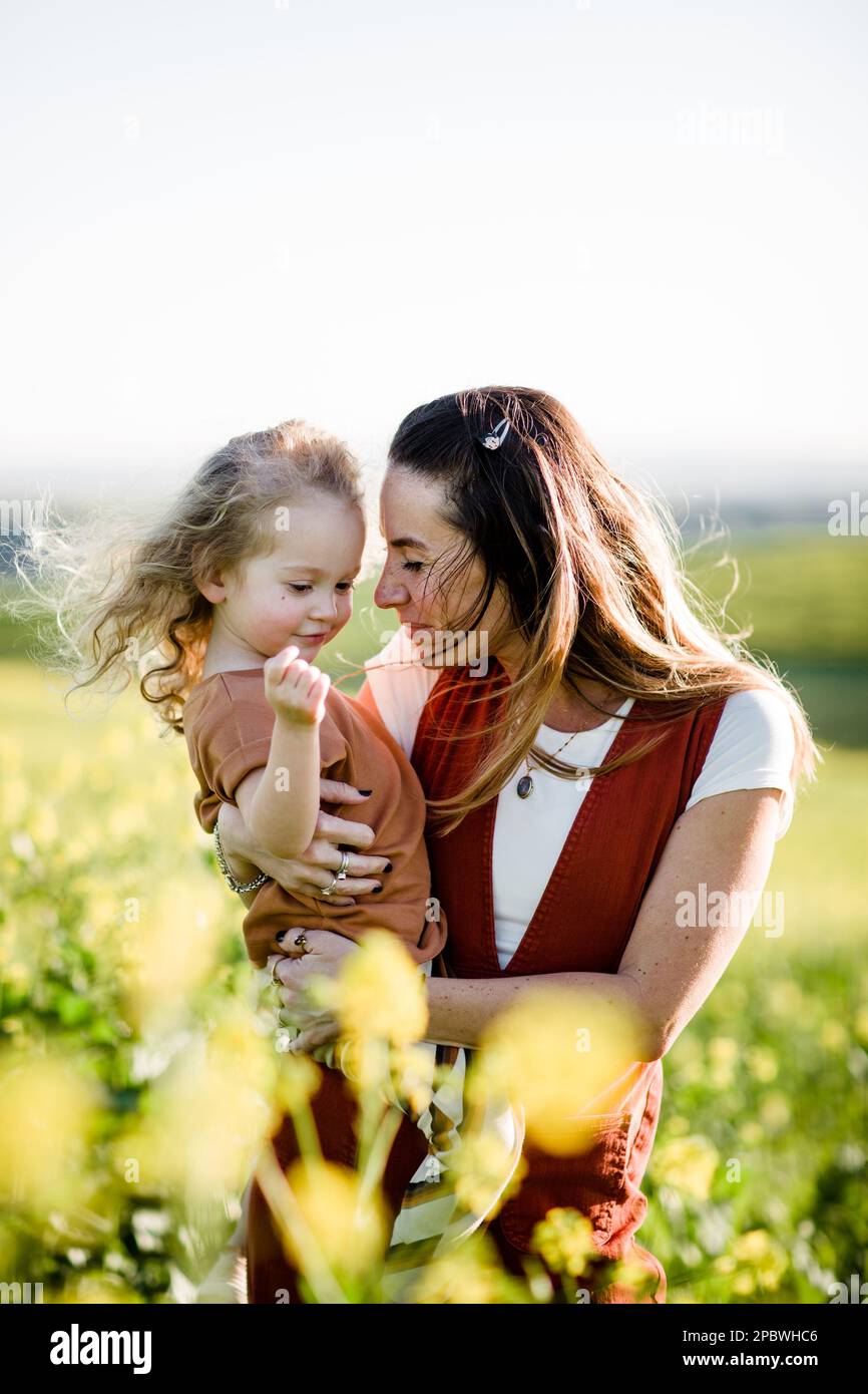 Mother & Daughter in Flower Field in San Diego Stock Photo Alamy