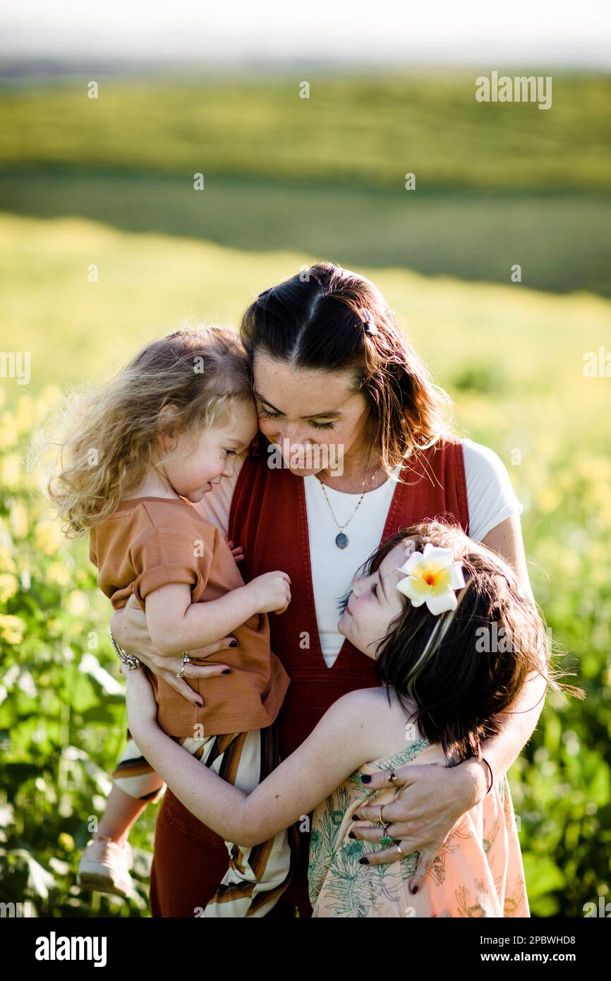 Mother & Daughters in Flower Field in San Diego Stock Photo Alamy