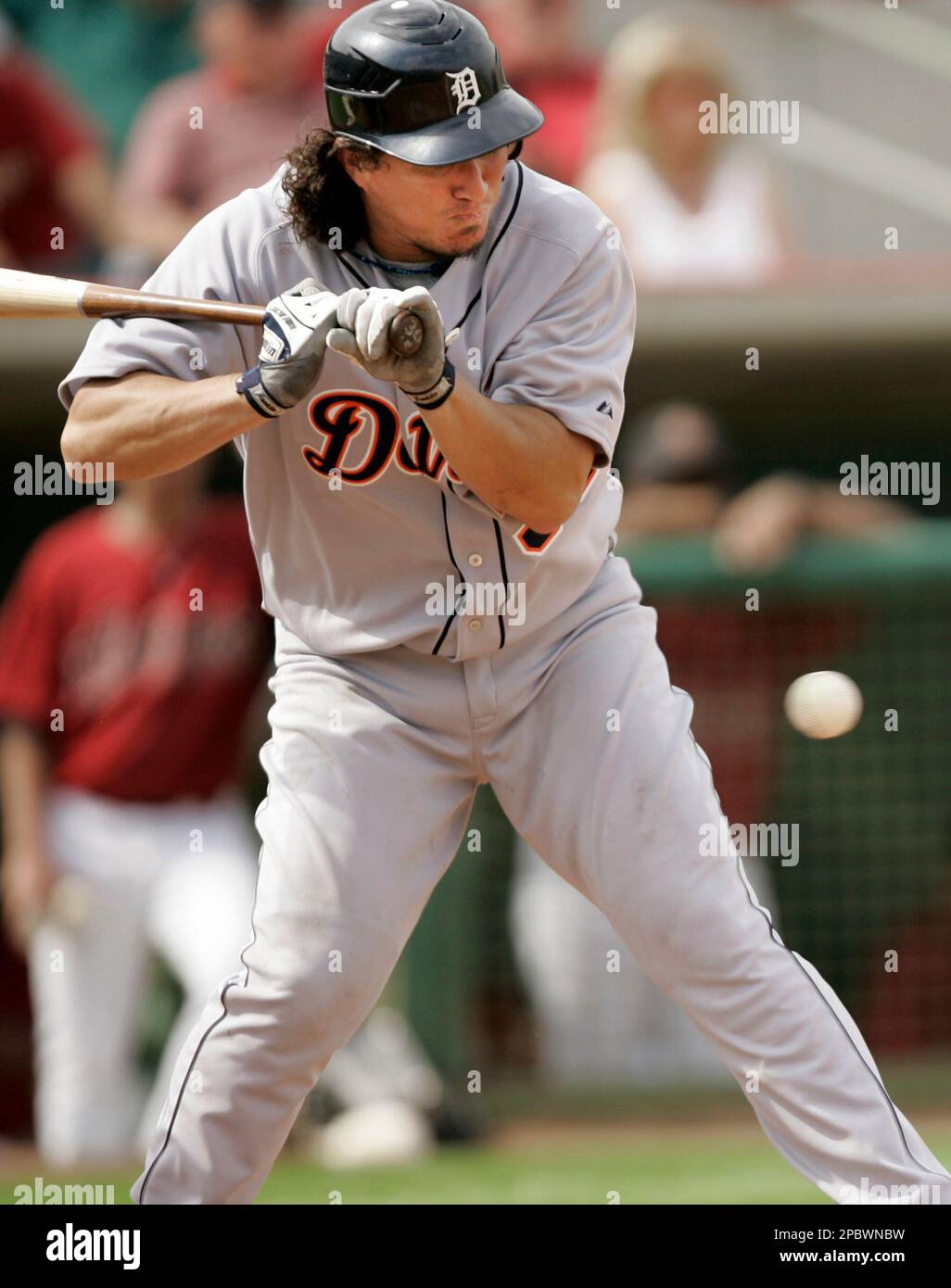 Chicago White Sox third baseman Joe Crede (24) throws Detroit Tigers second  baseman Omar Infante out at first in the top of the fourth inning at U.S.  Cellular Field in Chicago on