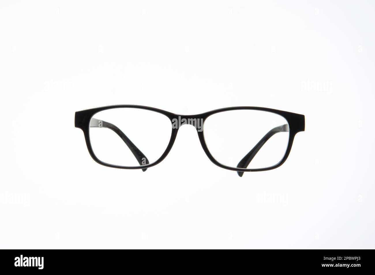 Black plastic frame eyeglasses. Close up studio shot, isolated on white