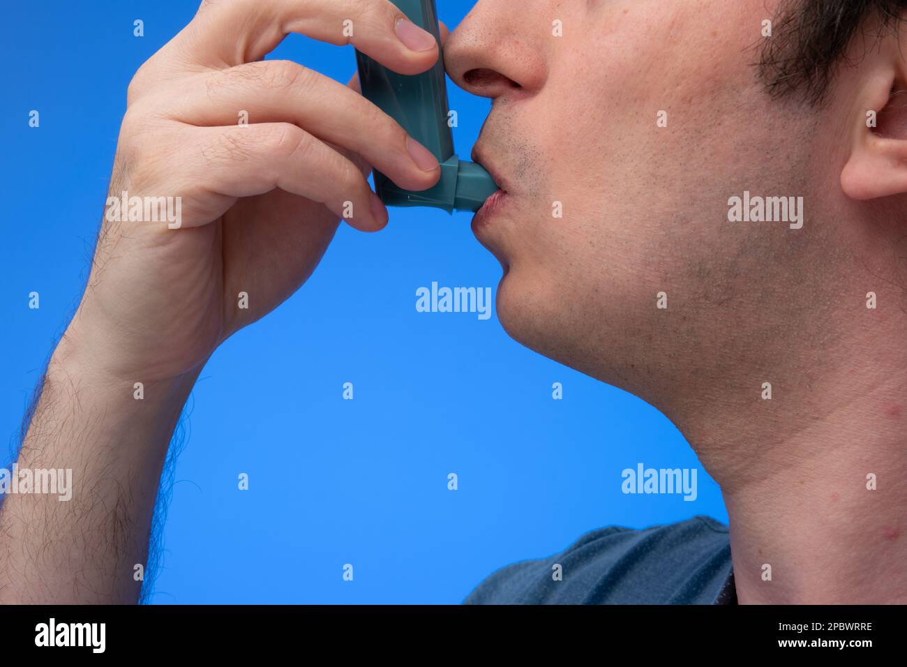 Asthma inhaler, generic, nonbranded, being used by unrecognizable by