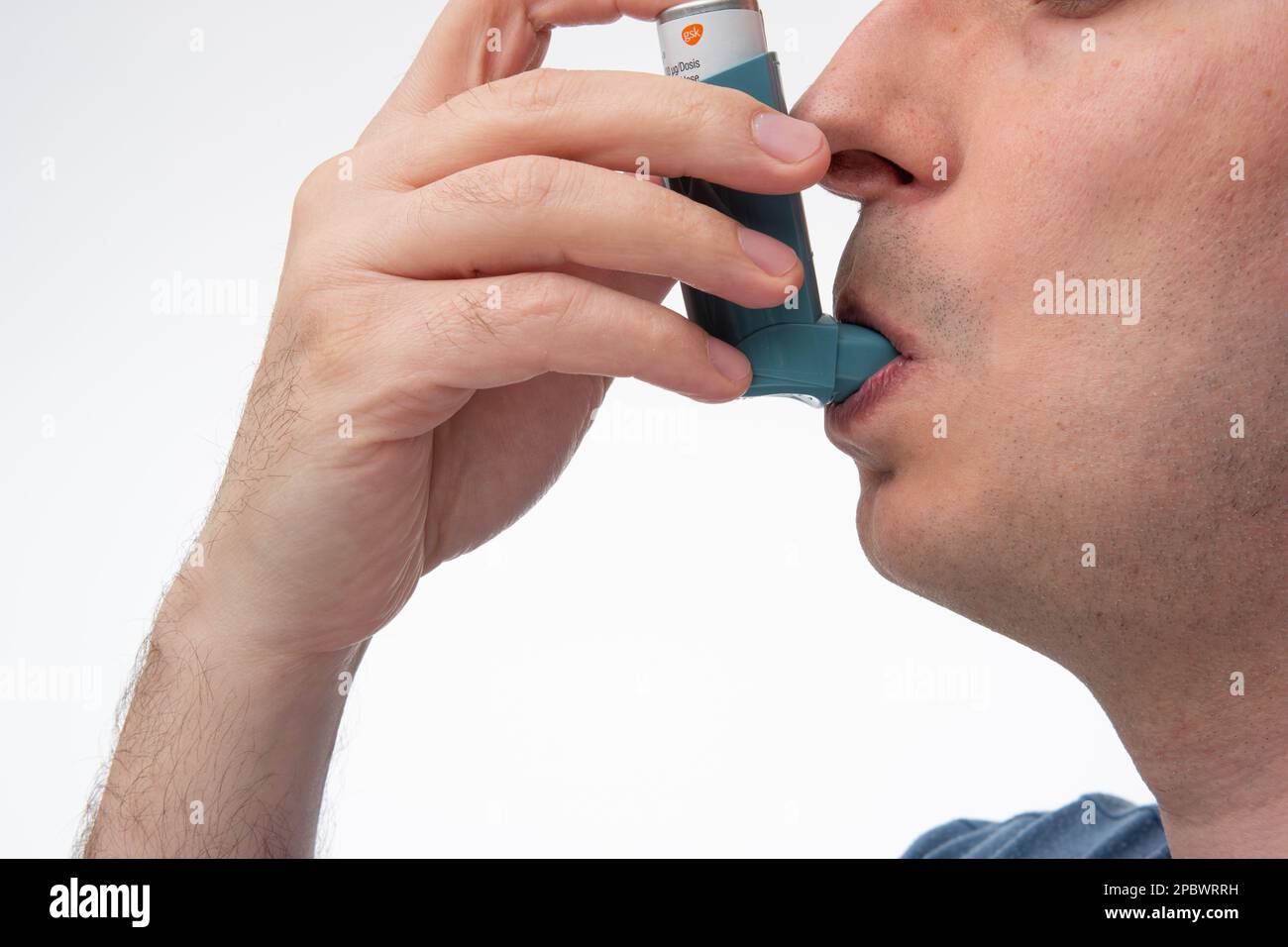 Asthma inhaler, generic, nonbranded, being used by unrecognizable by