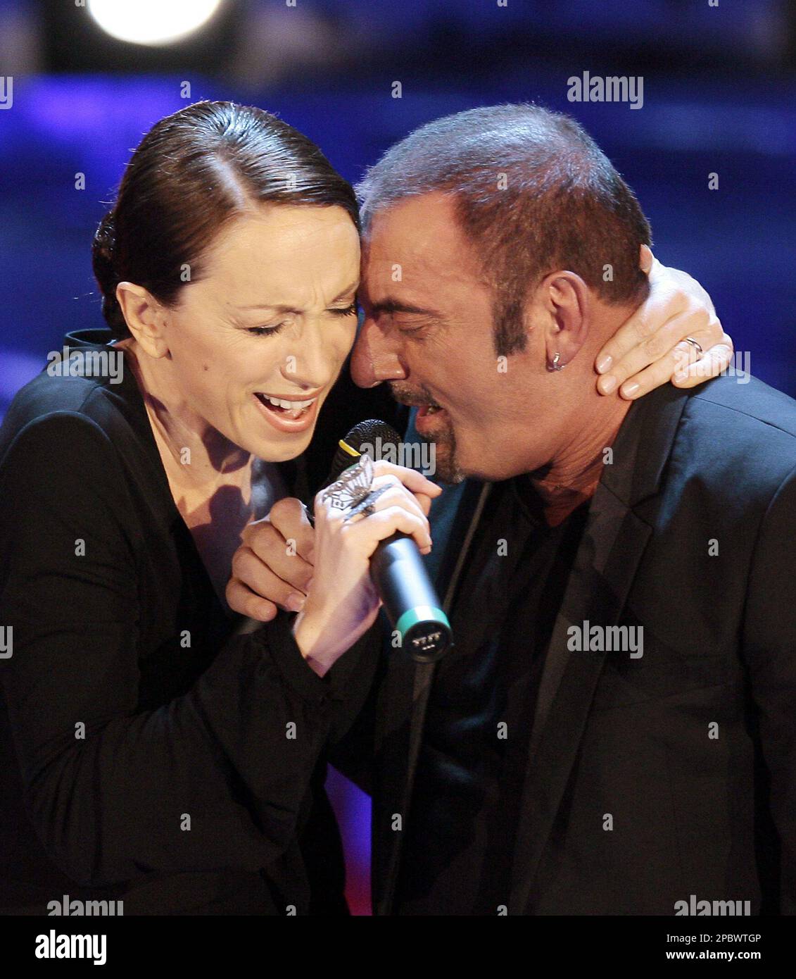 Mango and Laura Valente sing "Chissa' se nevica" during the "Festival