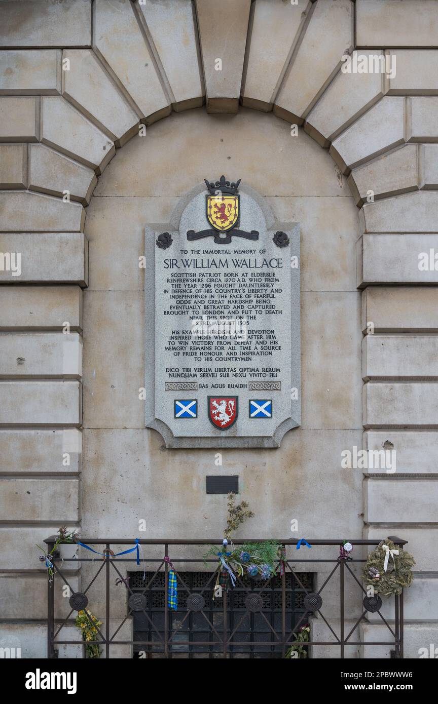 William Wallace Memorial, situated on the outer wall of St. Bartholomew