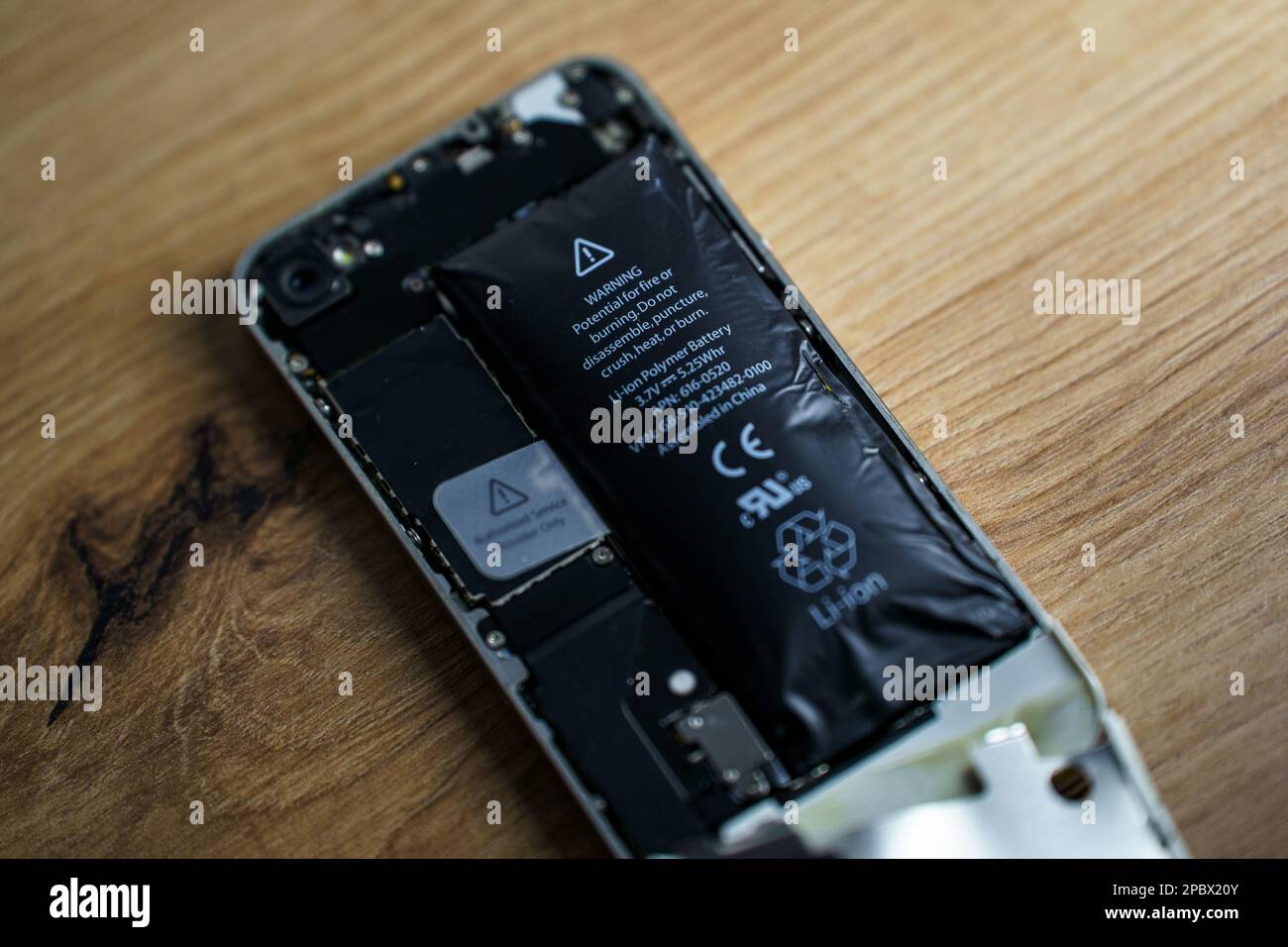 Kaunas, Lithuania 2023 Marh 13 Iphone with exploded Lithiumion