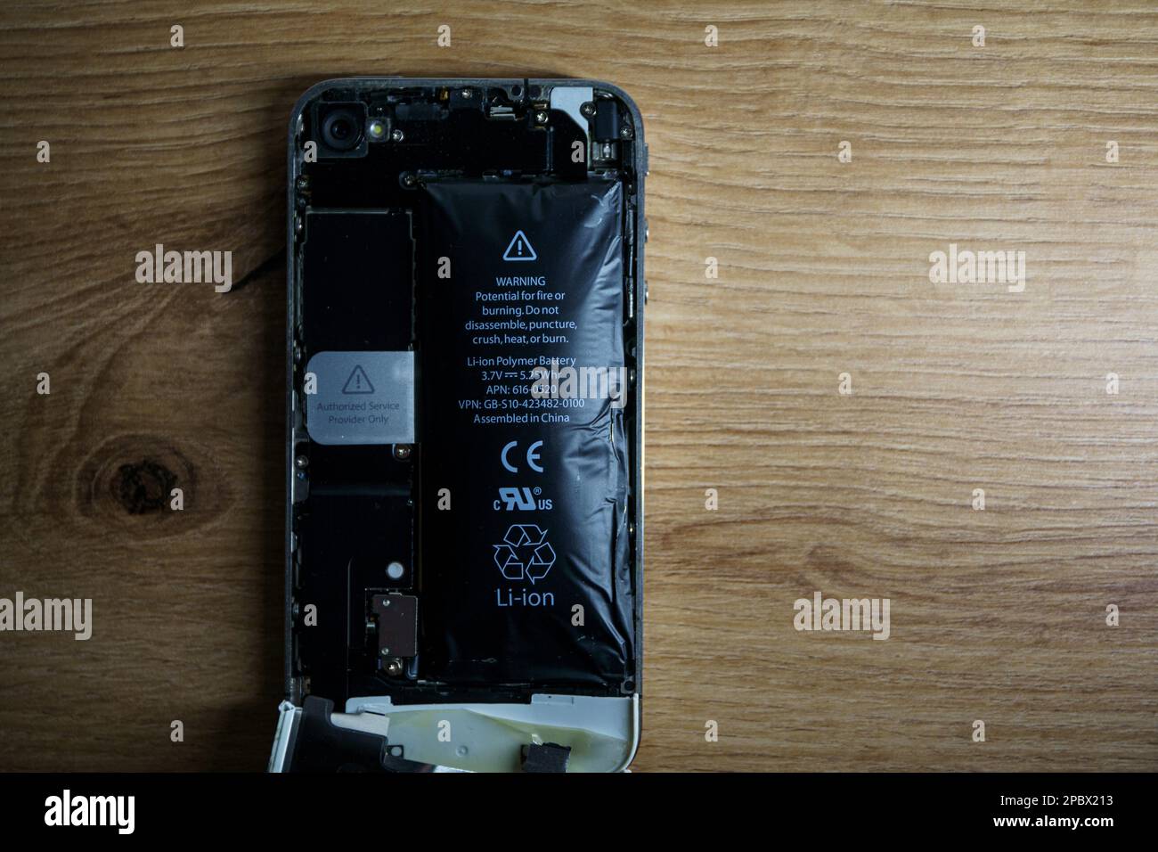 Kaunas, Lithuania - 2023 Marh 13: Iphone with exploded Lithium-ion battery.  Li-ion swollen battery. High quality photo Stock Photo - Alamy