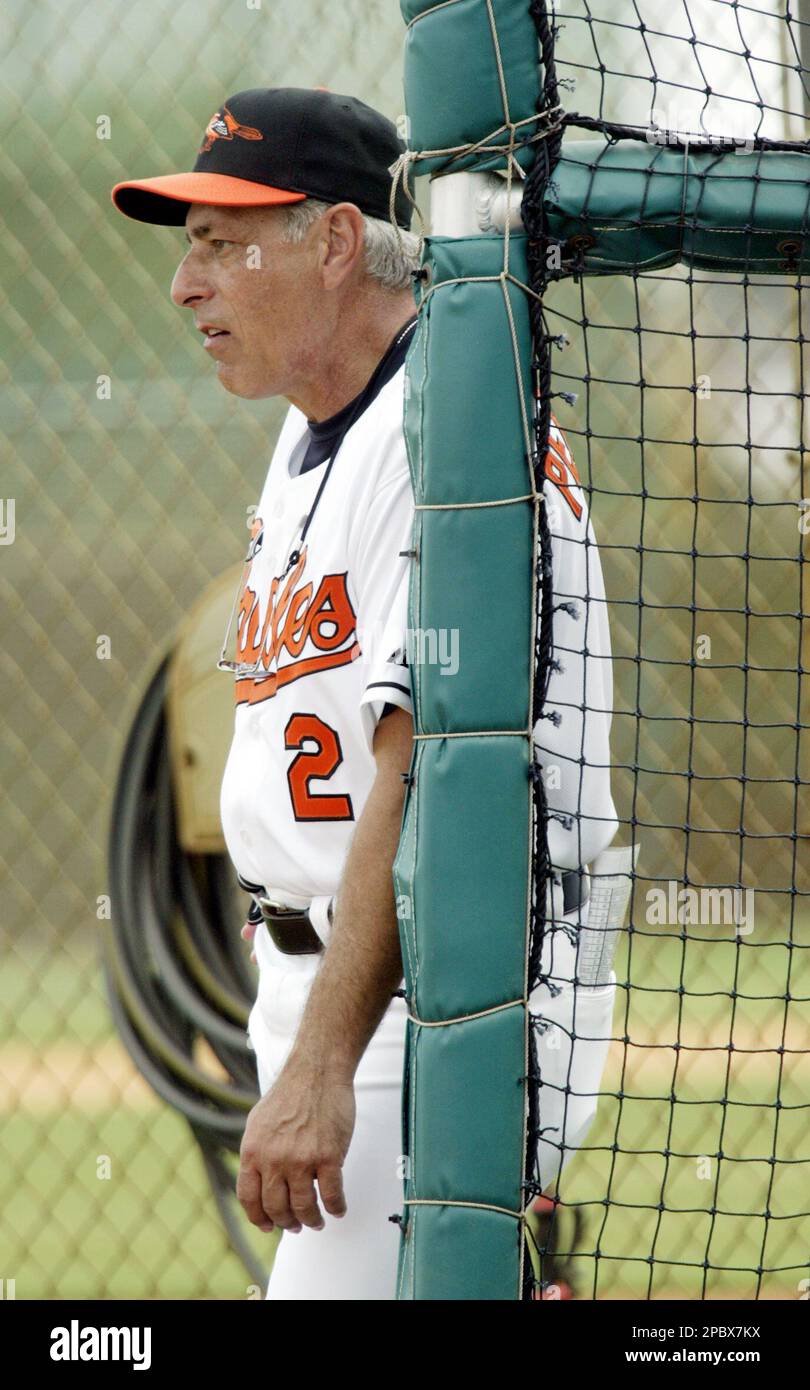 Sam Perlozzo, manager for the Baltimore Orioles watches practice while ...