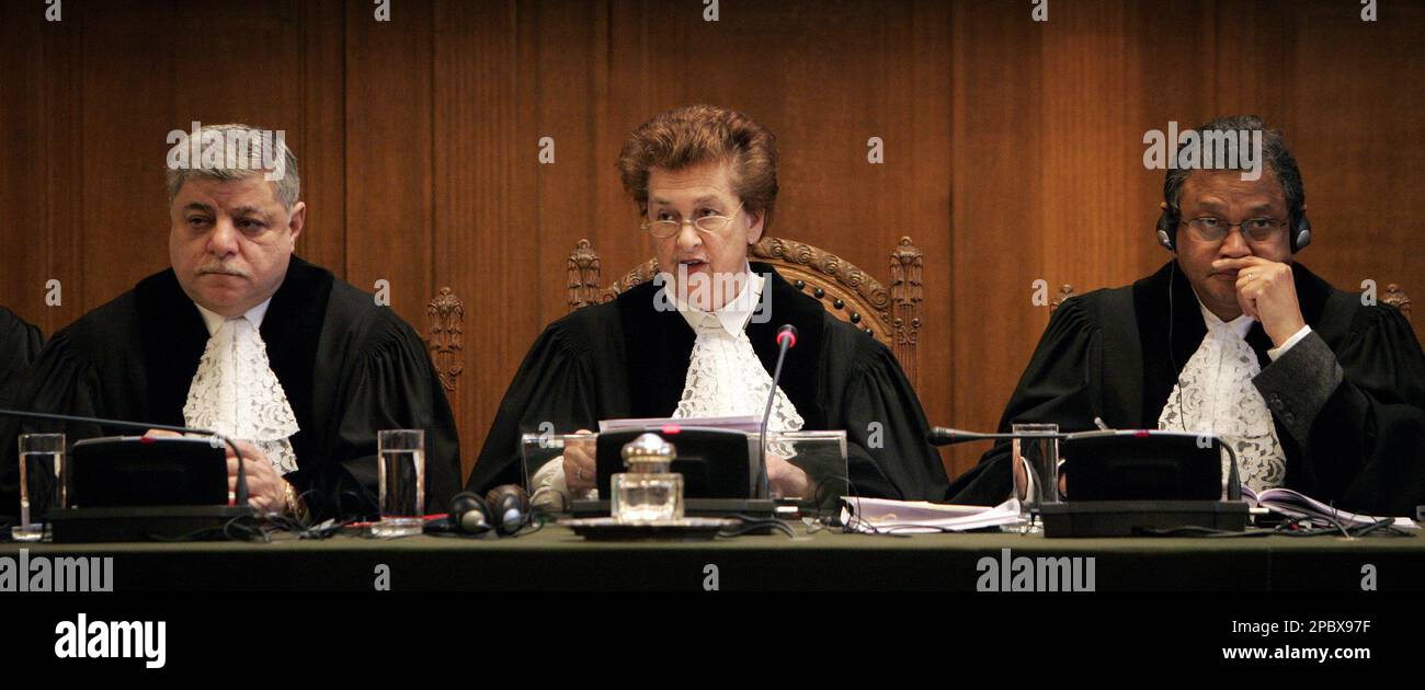 From left: Vice-President of the Court Judge Awn Shawkat Al-Khasawneh ...