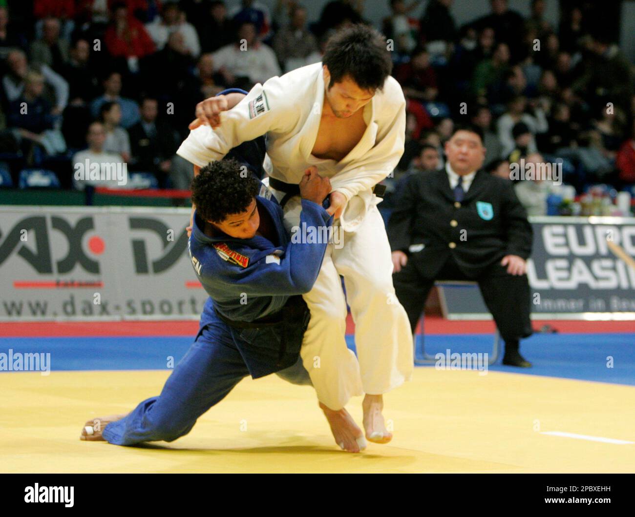 Takashi Ono from Japan and Sergei Aschwanden from Switzerland left during their bout of the men s up to 81kg weight category at the Judo Super World Cup Hamburg northern Germany Sunday Feb