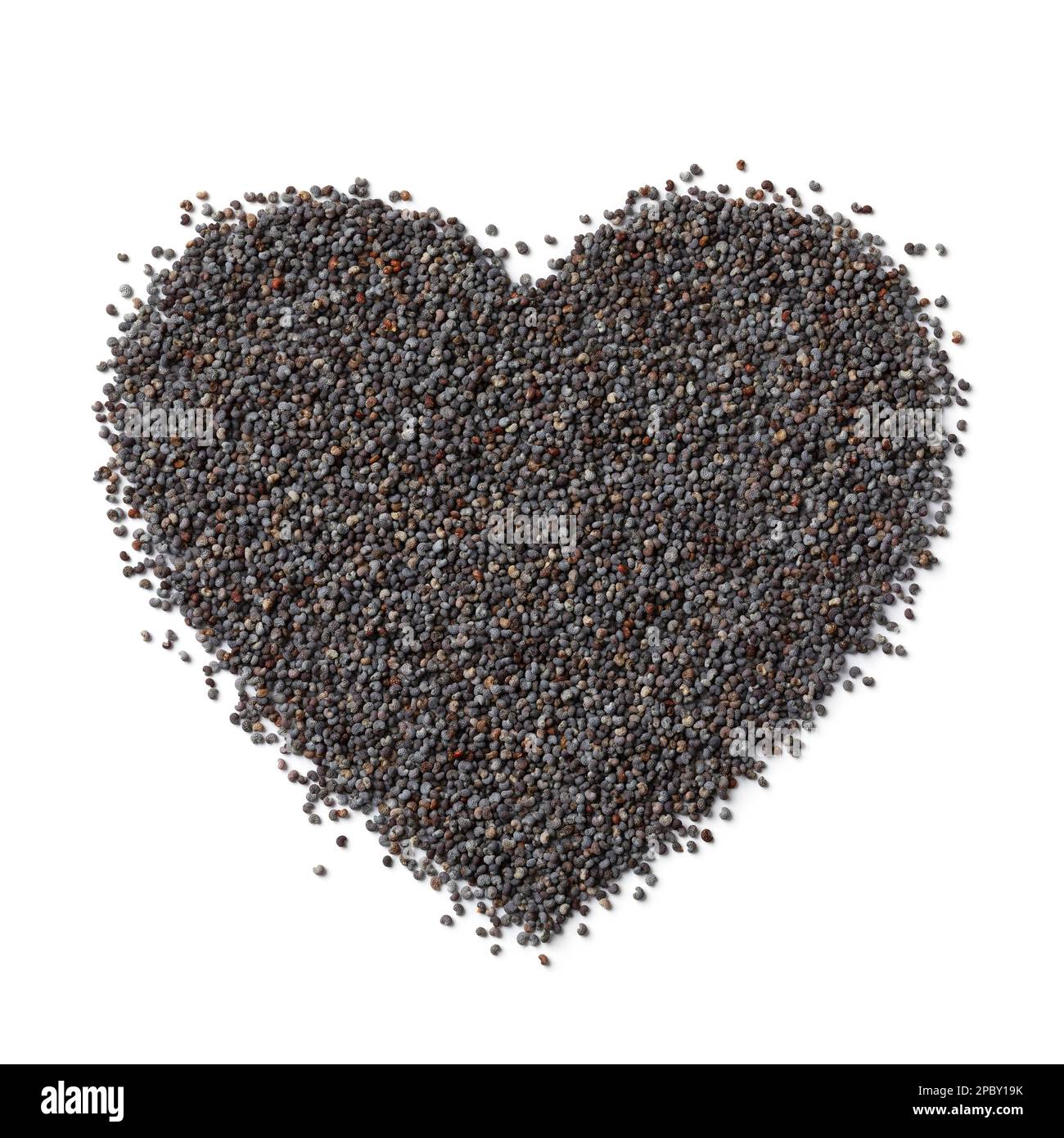 Black opium poppy seed in heart shape isolated on white background Stock Photo
