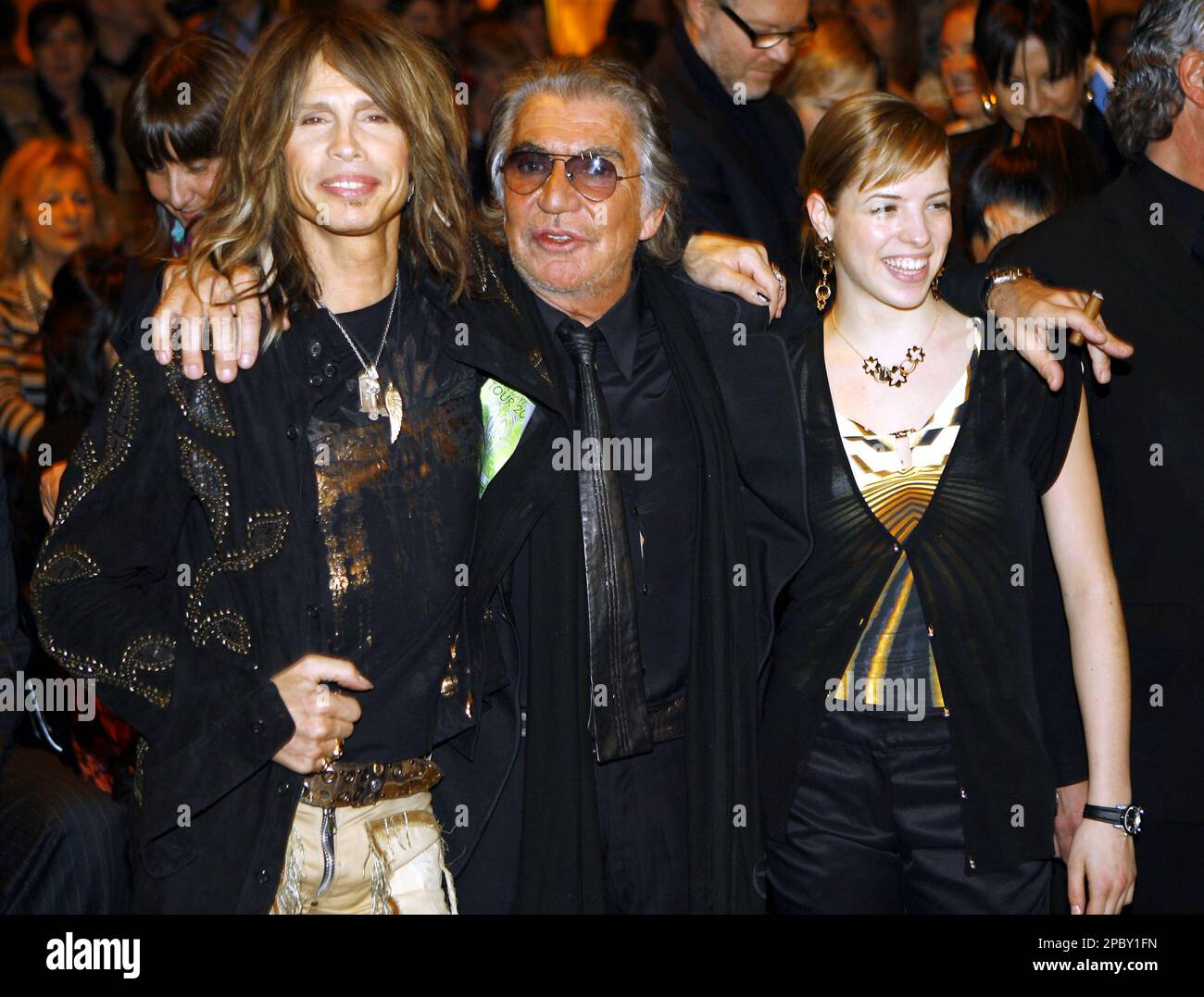 Italian designer Roberto Cavalli is flanked by Steven Tyler, lead Italian designer Roberto Cavalli is flanked by Steven Tyler, lead