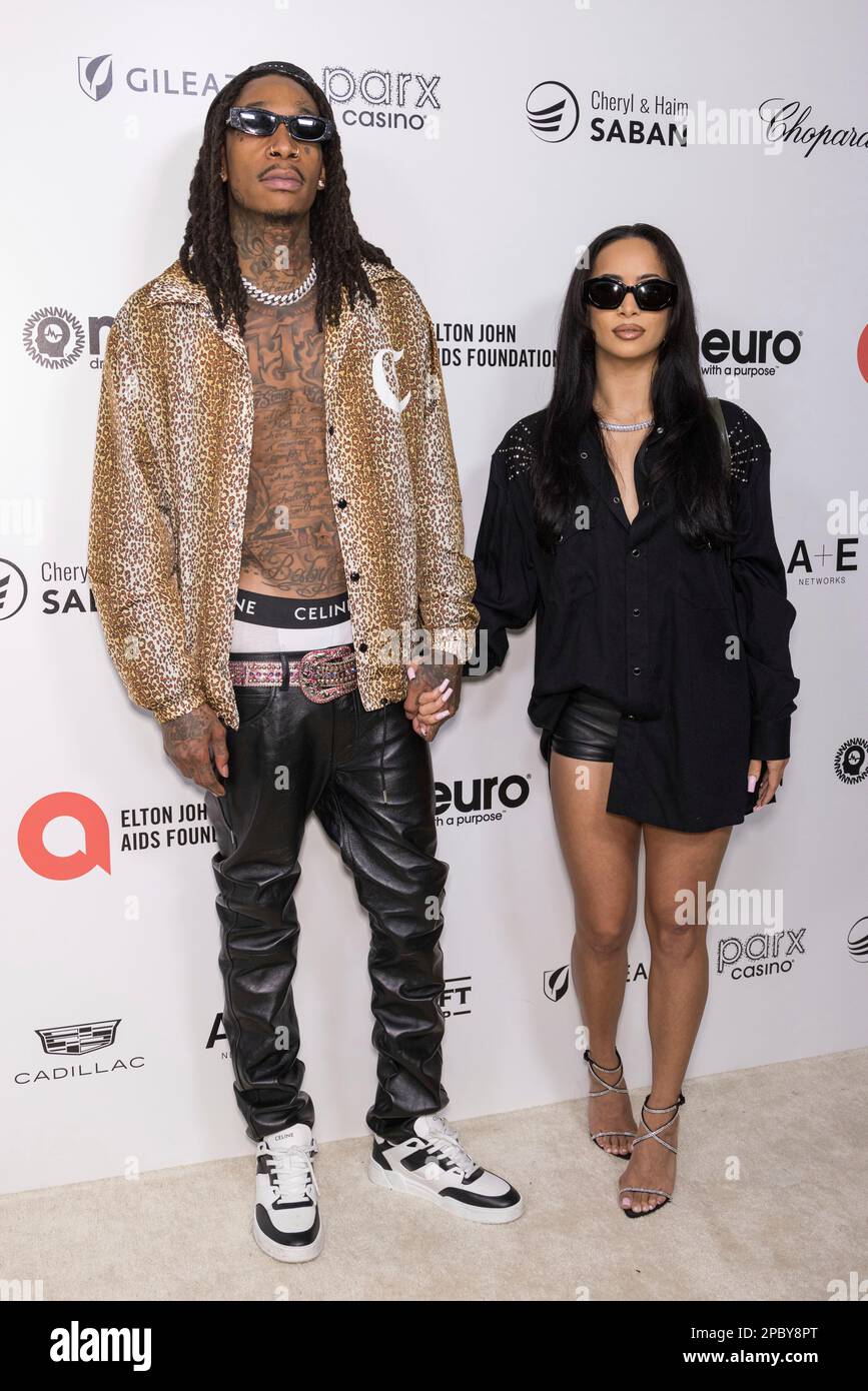 Wiz Khalifa, left and Aimee Aguilar arrive at the Elton John AIDS