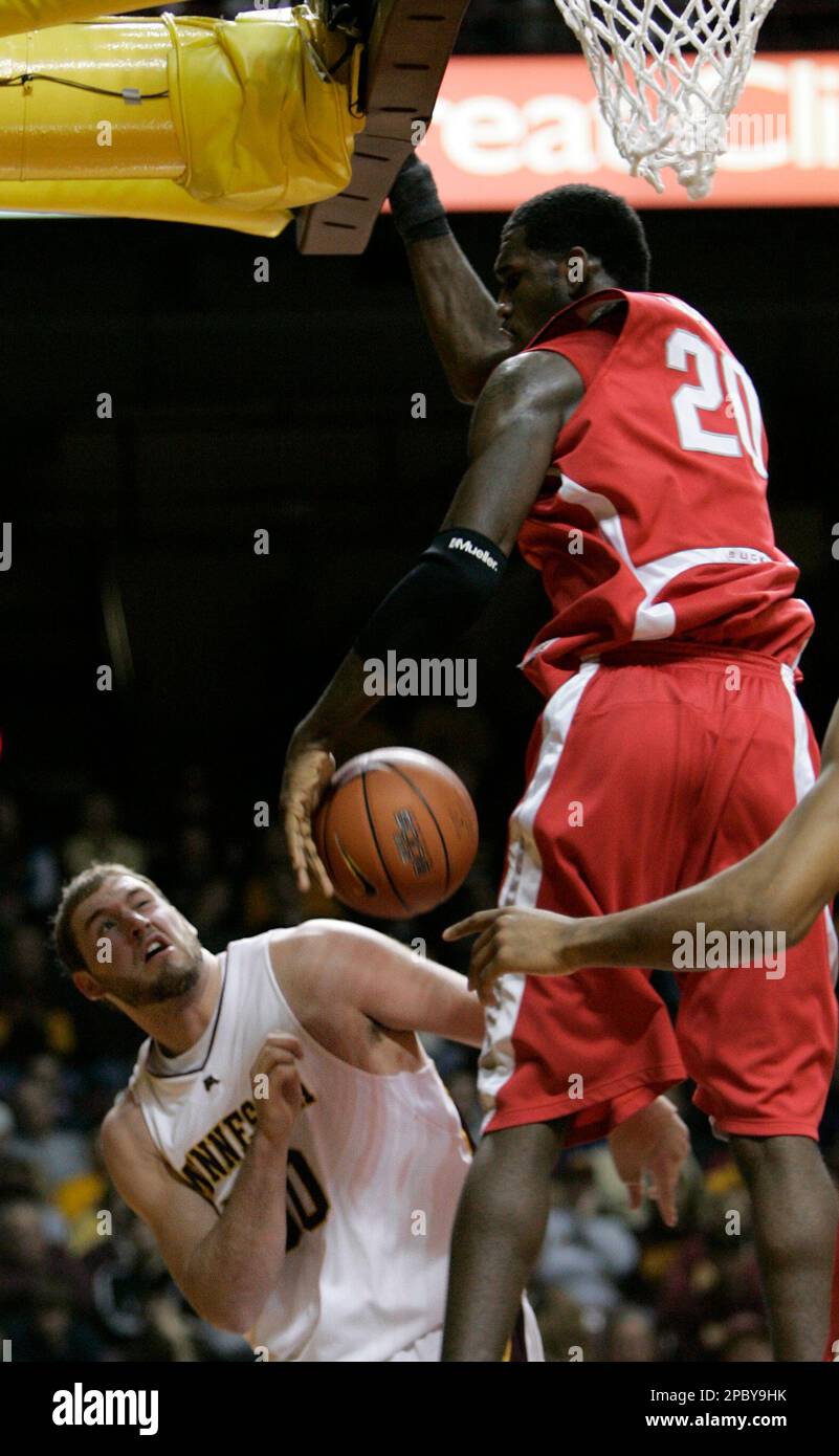 Ohio State forward Kosta Koufos (31), right, shoots over Minnesota center  Spencer Tollackson, left, during the first half of the basketball game  Saturday, March 1, 2008, in Minneapolis. Koufos had a team-high