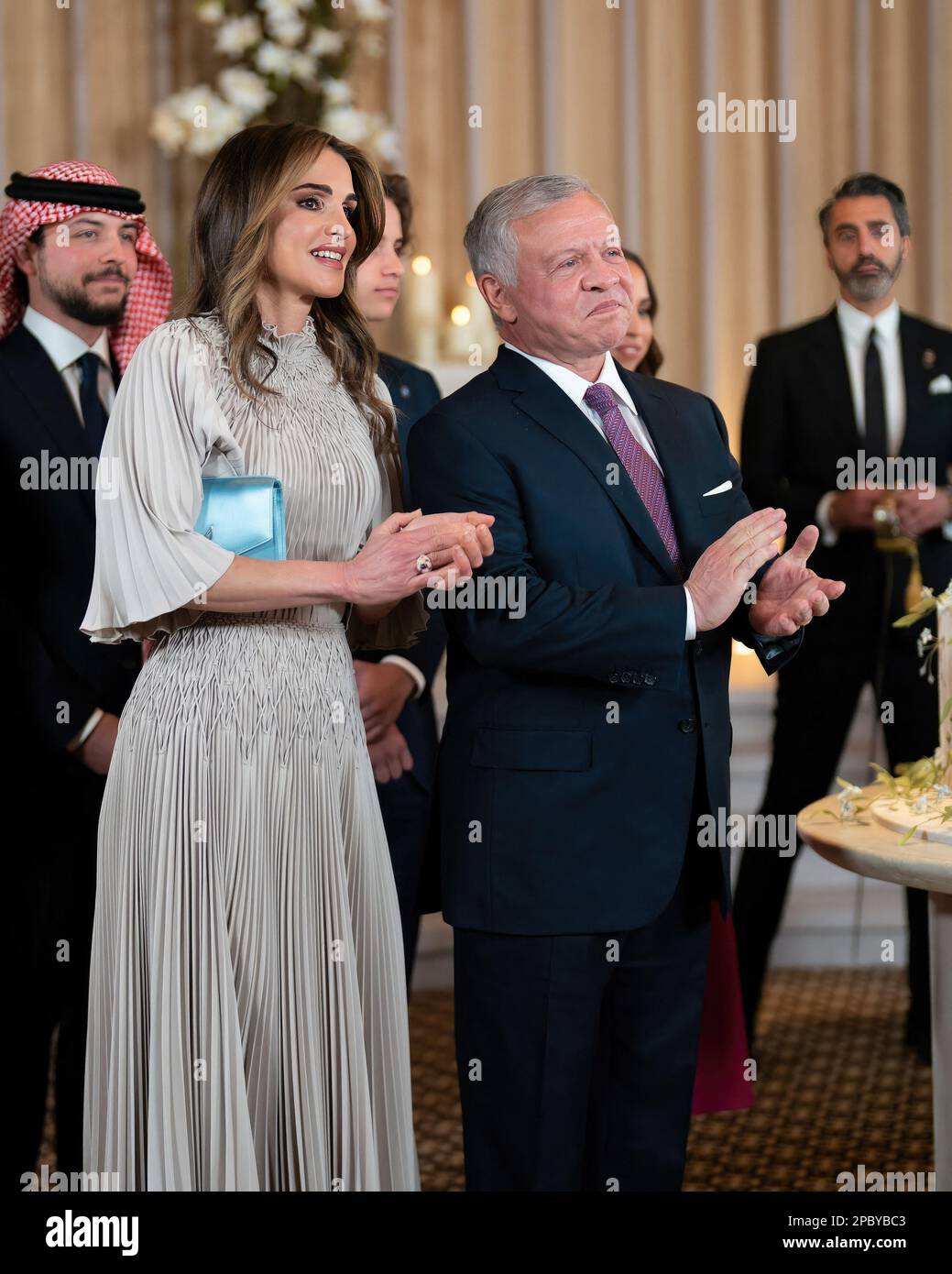 Amman, Jordan. 12th Mar, 2023. King Abdullah II of Jordan and Queen Rania  attend their daughter Princess Iman bint Abdullah II's wedding, at Beit Al  Urdun (House of Jordan) Palace in Amman,