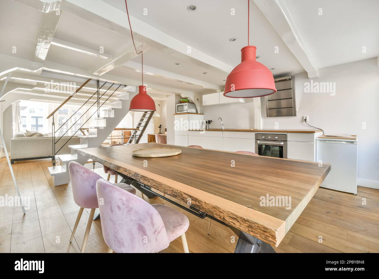 Interior design of spacious dining room with wooden table and chairs ...