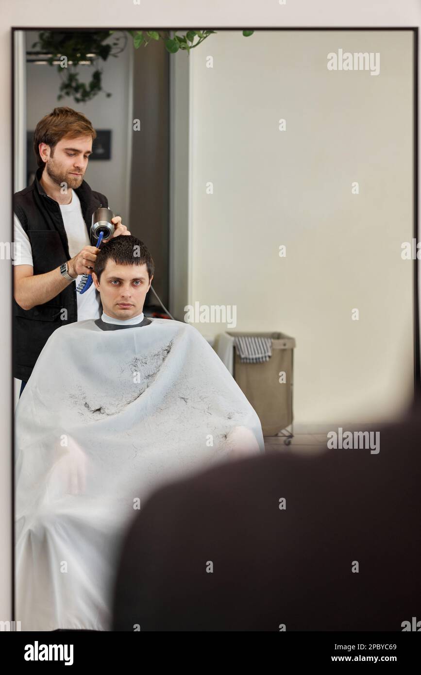 Male hairdresser professional drying hi-res stock photography and ...