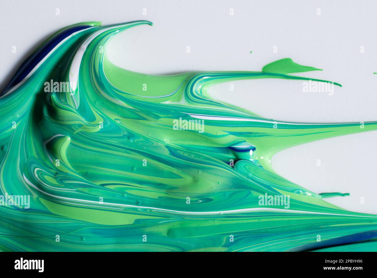 Mix of green and blue paint Stock Photo - Alamy