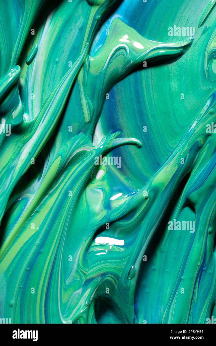 Mix of green and blue paint Stock Photo - Alamy