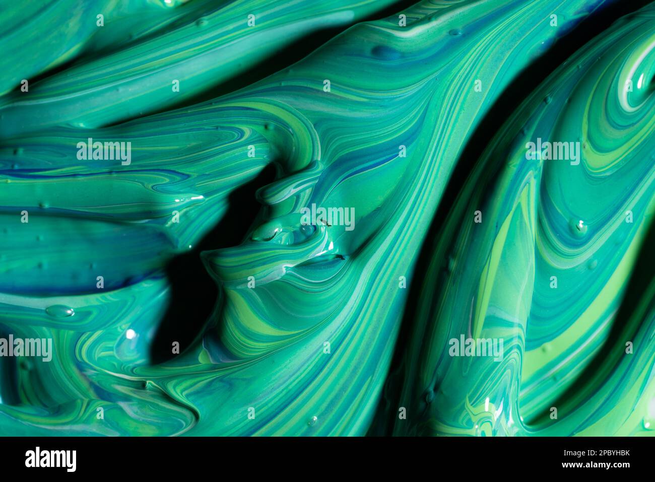 Mix of green and blue paint Stock Photo - Alamy