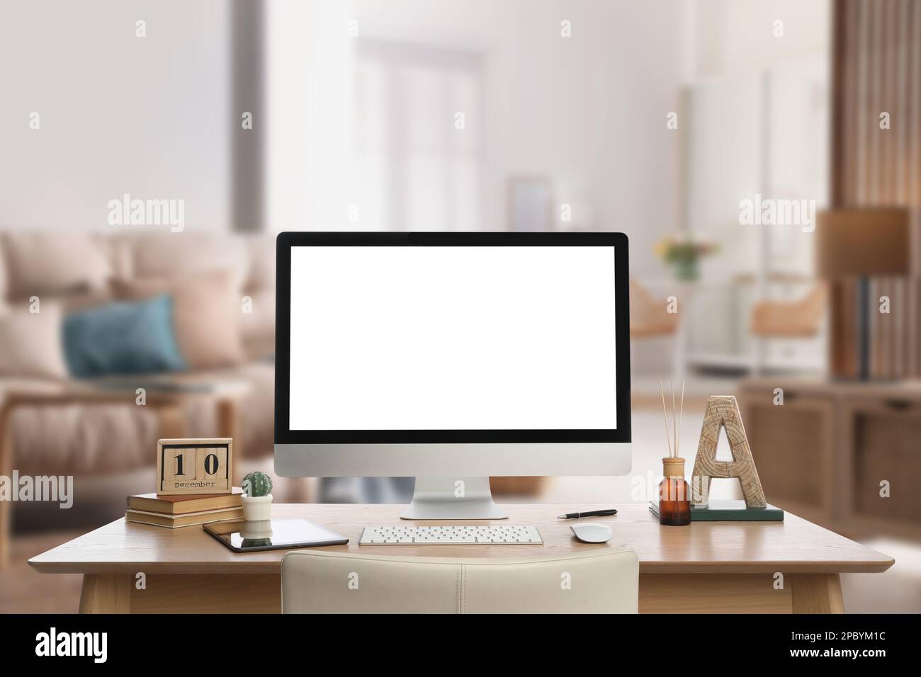 Workplace with modern computer on wooden table indoors. Mockup for ...