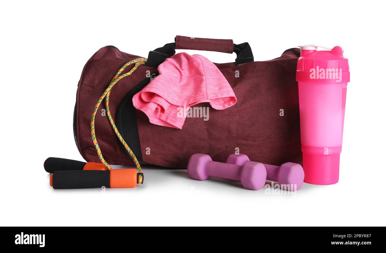 Sports bag and gym equipment on white background Stock Photo - Alamy