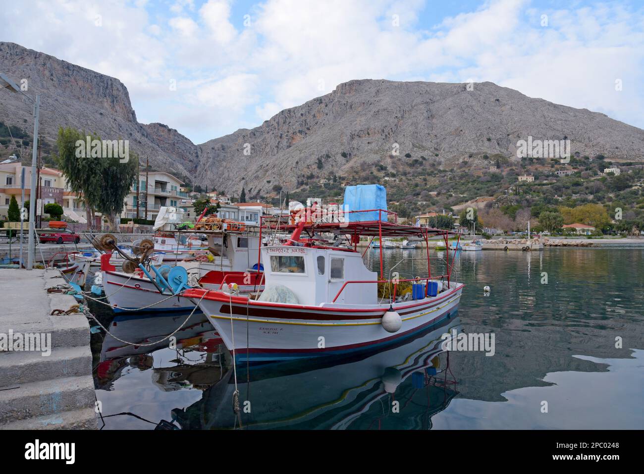 Fishing boats in Daskalopetra Harbour, island of Chios, Greece - Stock Image