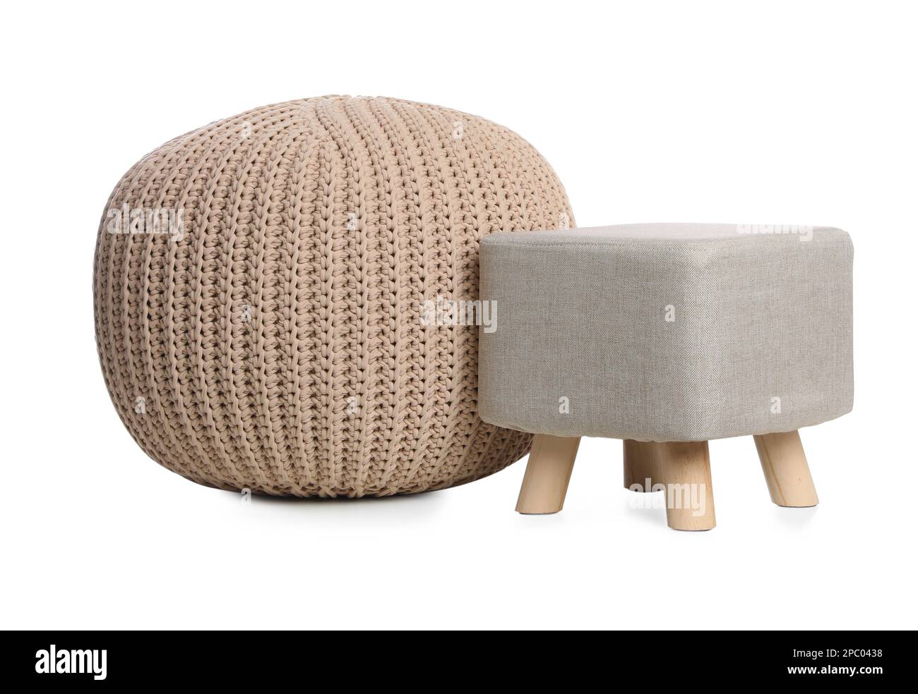 Stylish pouf and ottoman on white background. Home design Stock Photo - Alamy