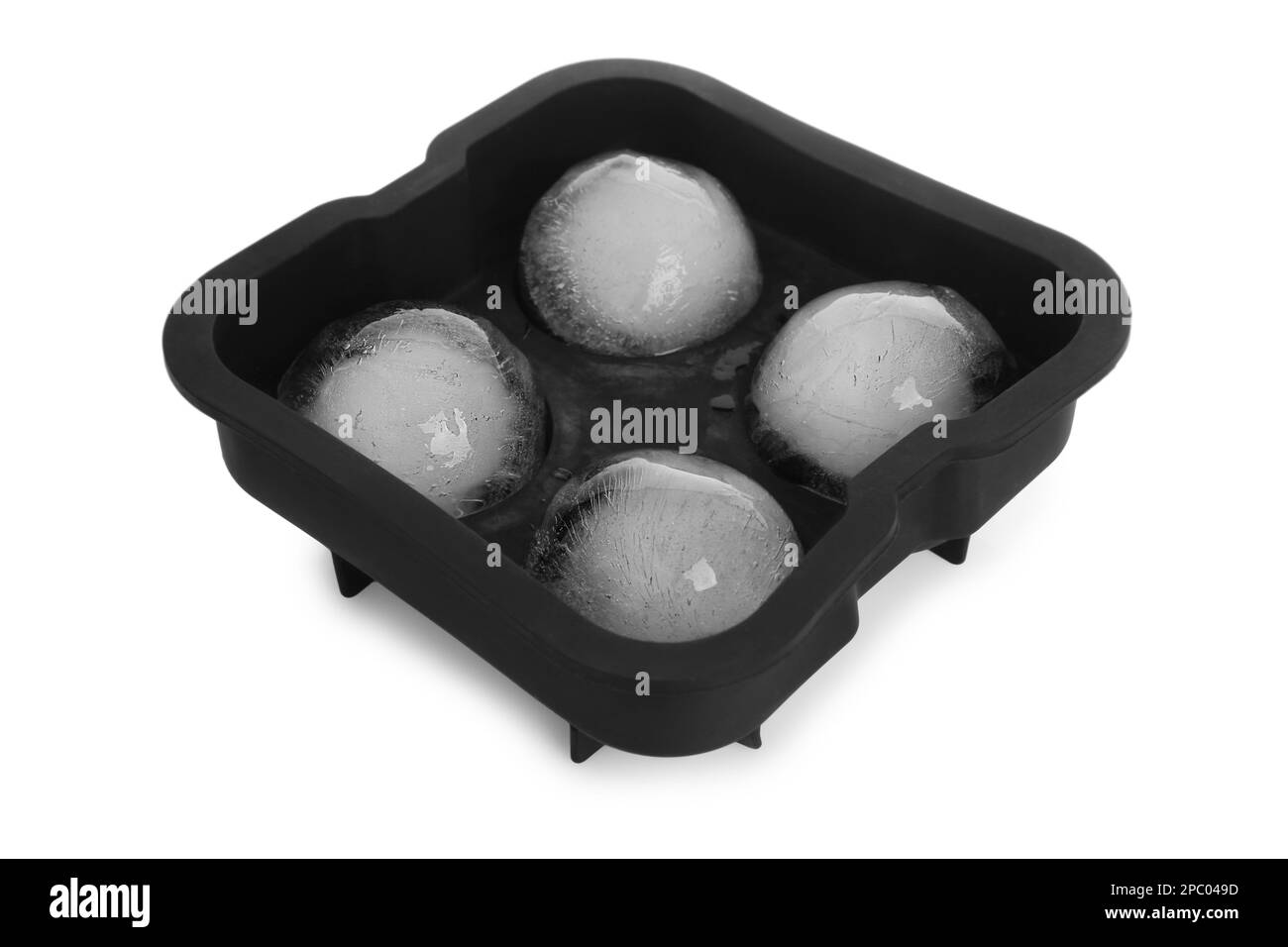 Frozen ice balls in mold on white background Stock Photo Alamy
