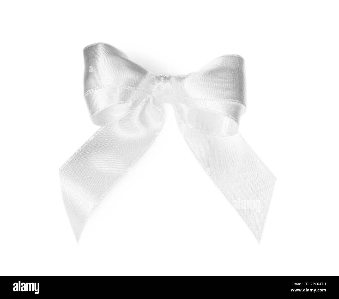 Satin ribbon tied in bow on white background, top view Stock Photo - Alamy