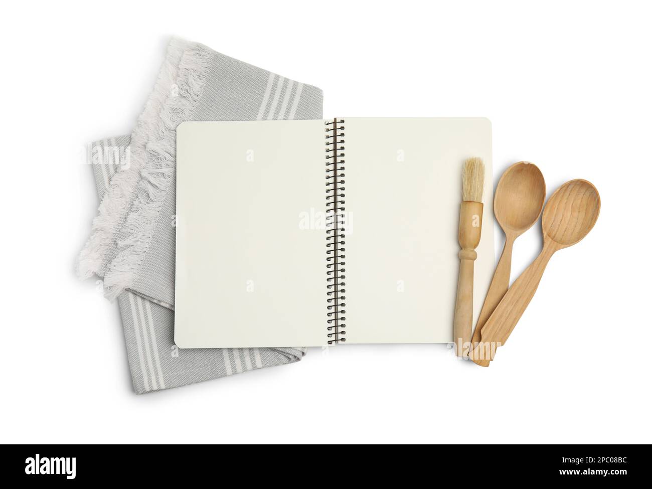 https://c8.alamy.com/comp/2PC08BC/blank-recipe-book-napkin-and-wooden-utensils-on-white-background-top-view-space-for-text-2PC08BC.jpg