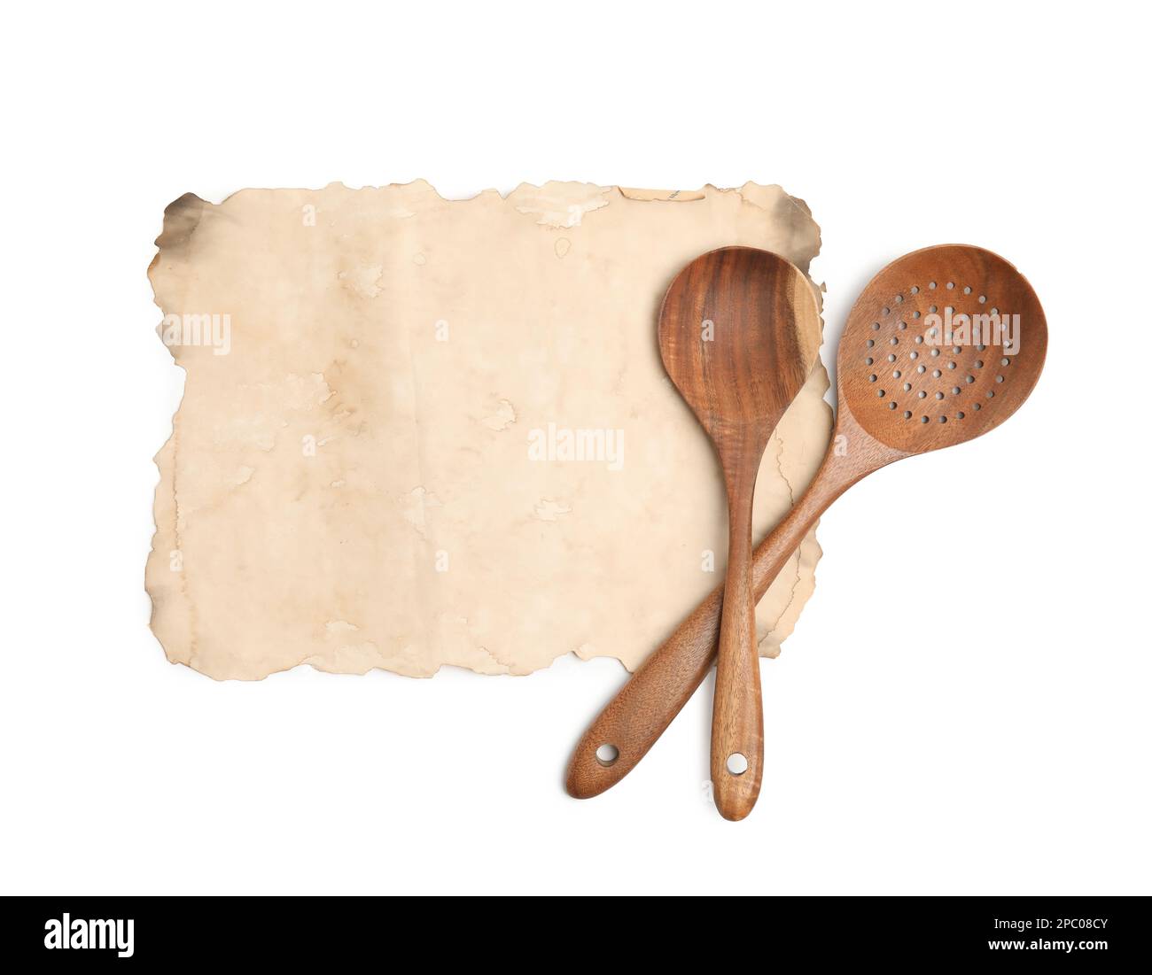 https://c8.alamy.com/comp/2PC08CY/old-cookbook-page-and-wooden-utensils-on-white-background-top-view-space-for-text-2PC08CY.jpg