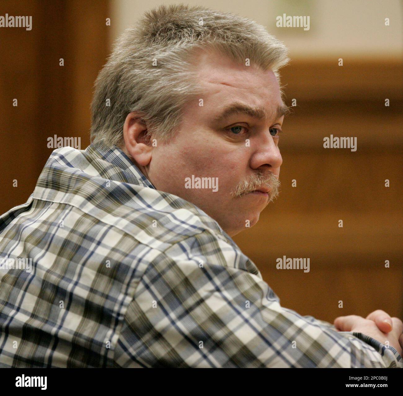 Steven Avery sits in the courtroom at the Calumet County Courthouse waiting for his murder trial