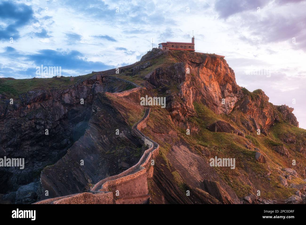 Basque country or Euskadi, Spain. San Juan de Gaztelugatxe island with church on the rock at sunrise. Travel destination Stock Photo