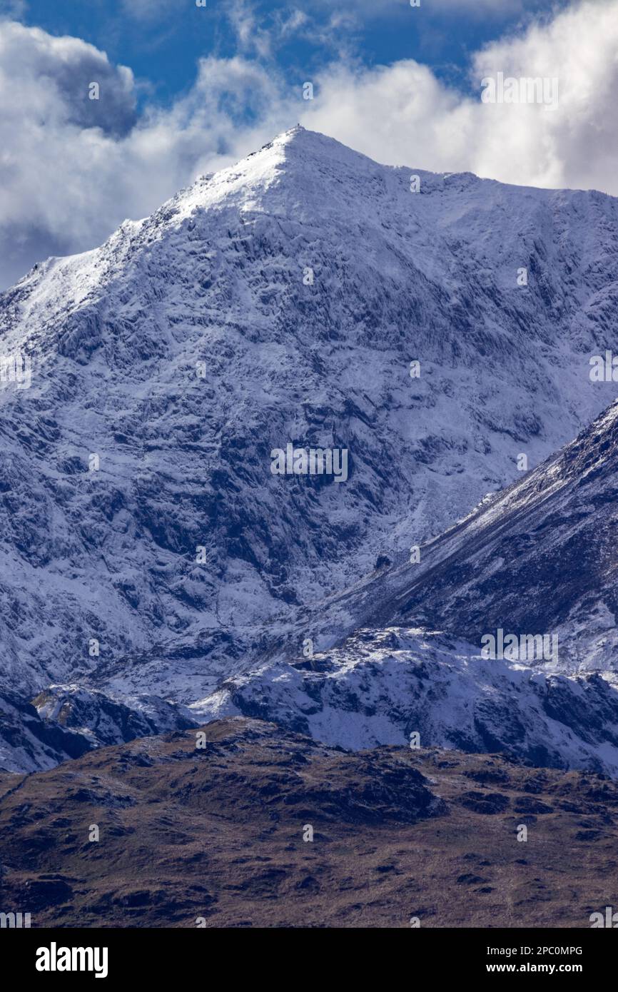 Snowdon mountain covered with snow, Snowdonia, North Wales Stock Photo