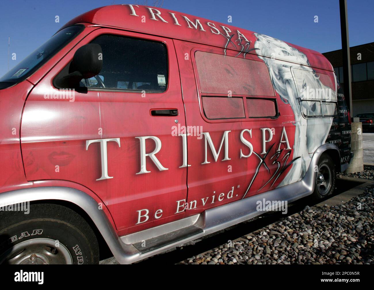 A TrimSpa van, with a depiction of Anna Nicole Smith and the words "Be