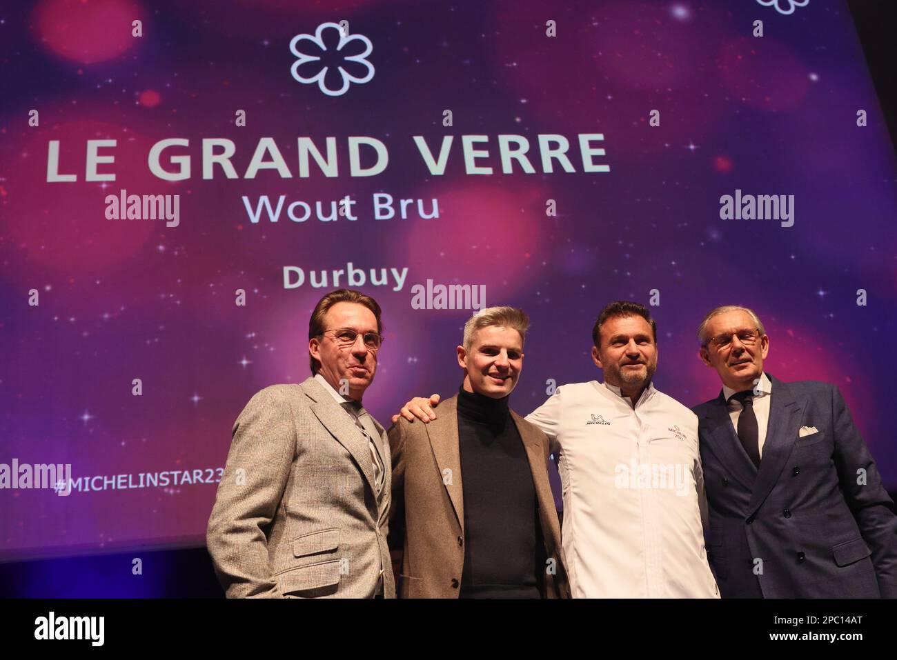 chef Tim Boury (L), Chef Peter Goossens (2L) and Maurice De Jaeger of Sensum (C) pictured during the presentation of the new edition of the Michelin 2023 restaurant and hotel guide for Belgium and Luxembourg, in Mons, Monday 13 March 2023. BELGA PHOTO BENOIT DOPPAGNE Stock Photo