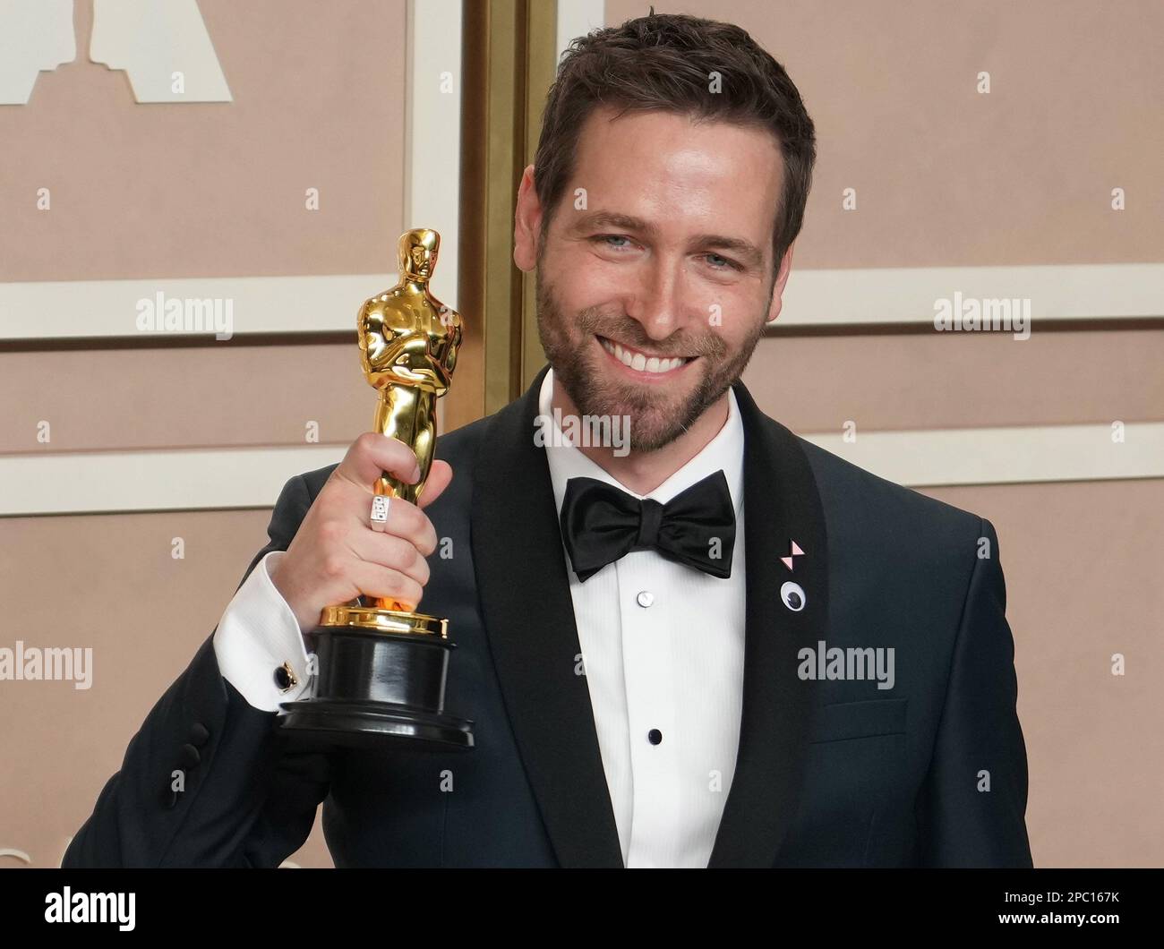 Paul Rogers, winner of the Best Film Editing award for ‘Everything